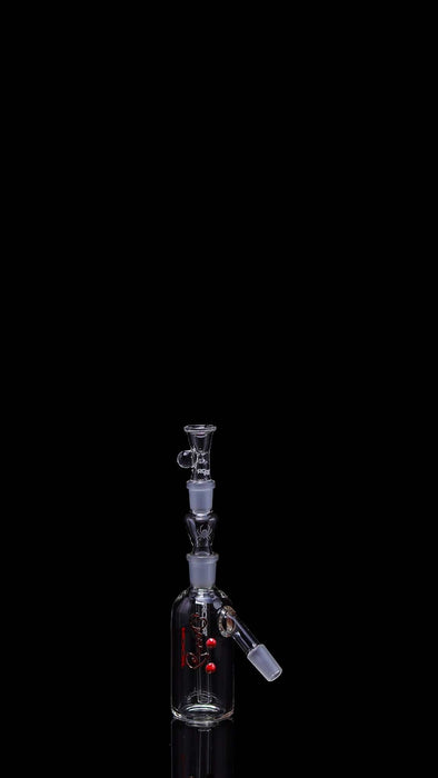 ROOR® Classic Ash Catcher with 14.5mm Joint, glass body, and 45° angle arm against a black background.