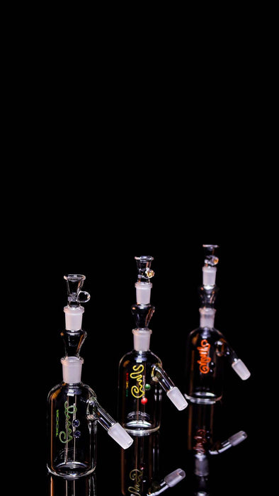 ROOR® Classic Ash Catcher 14.5mm, German Duran Schott Glass, with decals and male to female joint on black background.