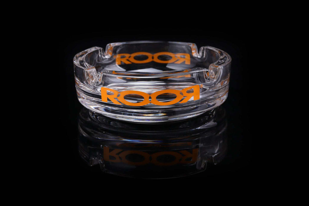 ROOR Collector Glass Ashtray with orange decal on black background.