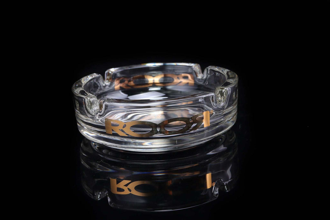 ROOR Collector Glass Ashtray with gold ROOR decal on black background.