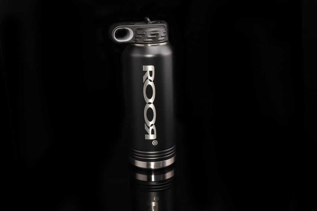 ROOR Water Bottle 32oz with black exterior and silver logo on a dark background.