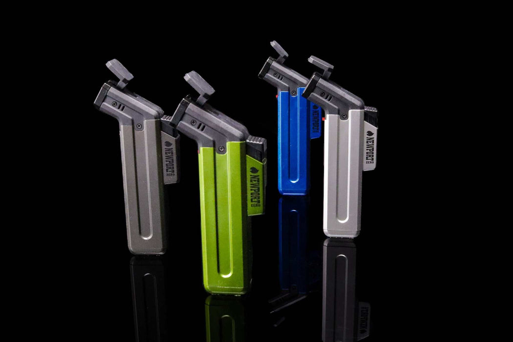 Colorful Newport Zero metallic lighters on black background.