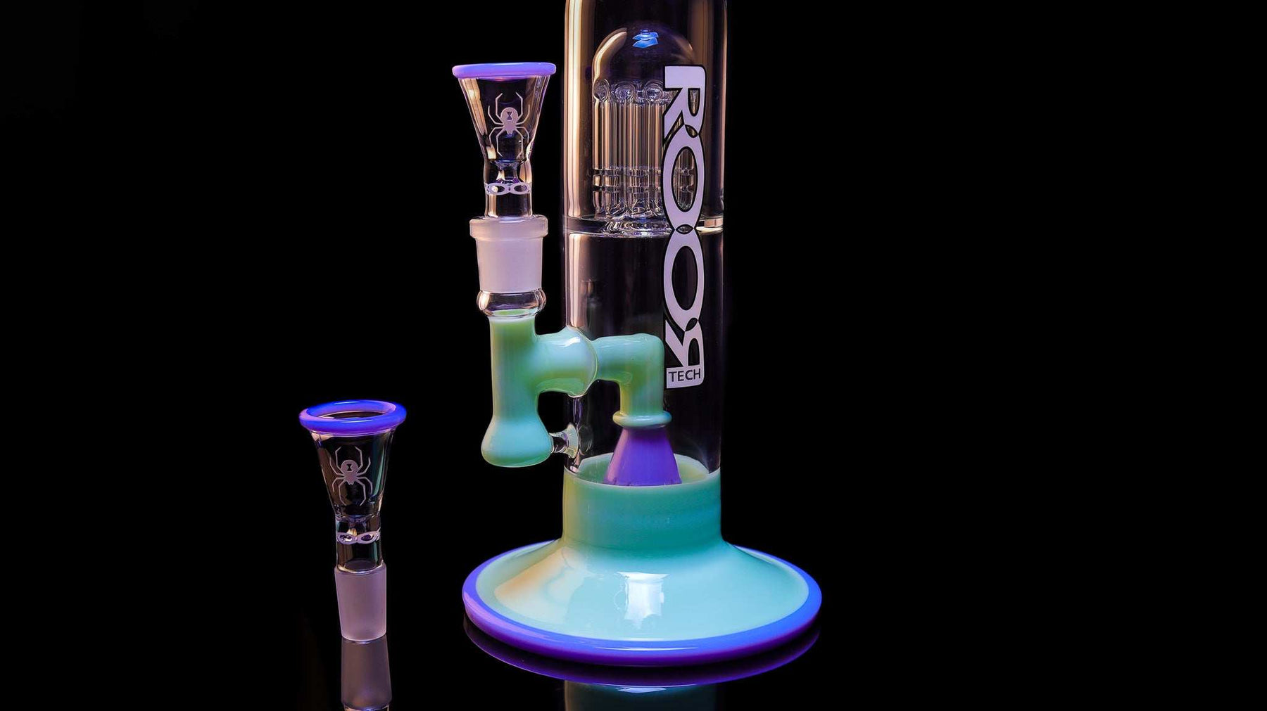 ROOR custom sandblasted funnel bowl with White Widow design and milky purple rim on a glass smoking pipe.