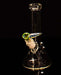 ROOR® HornTini Color Worked Bowl 10mm with a handcrafted design on a glass beaker.