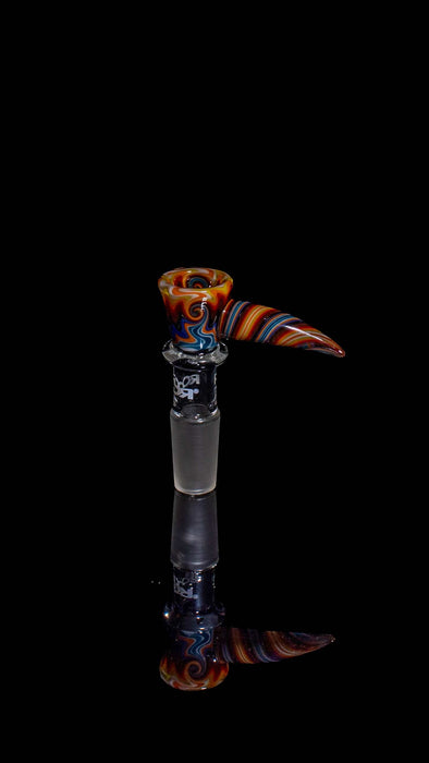 Glass smoking accessory with colorful design on a black background
