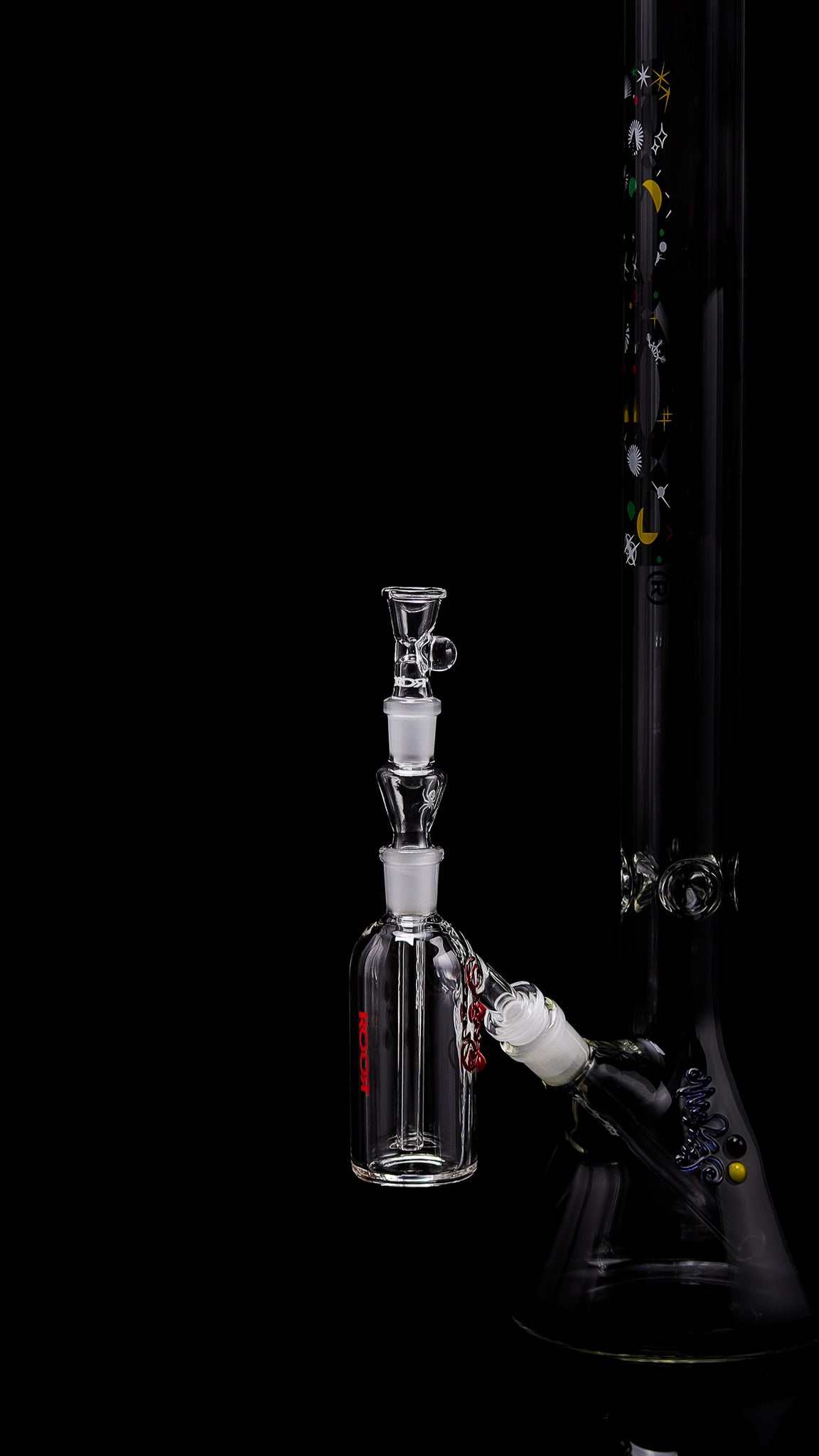 ROOR® Classic Ash Catcher 14.5mm joint with glass arm attachment on black background.