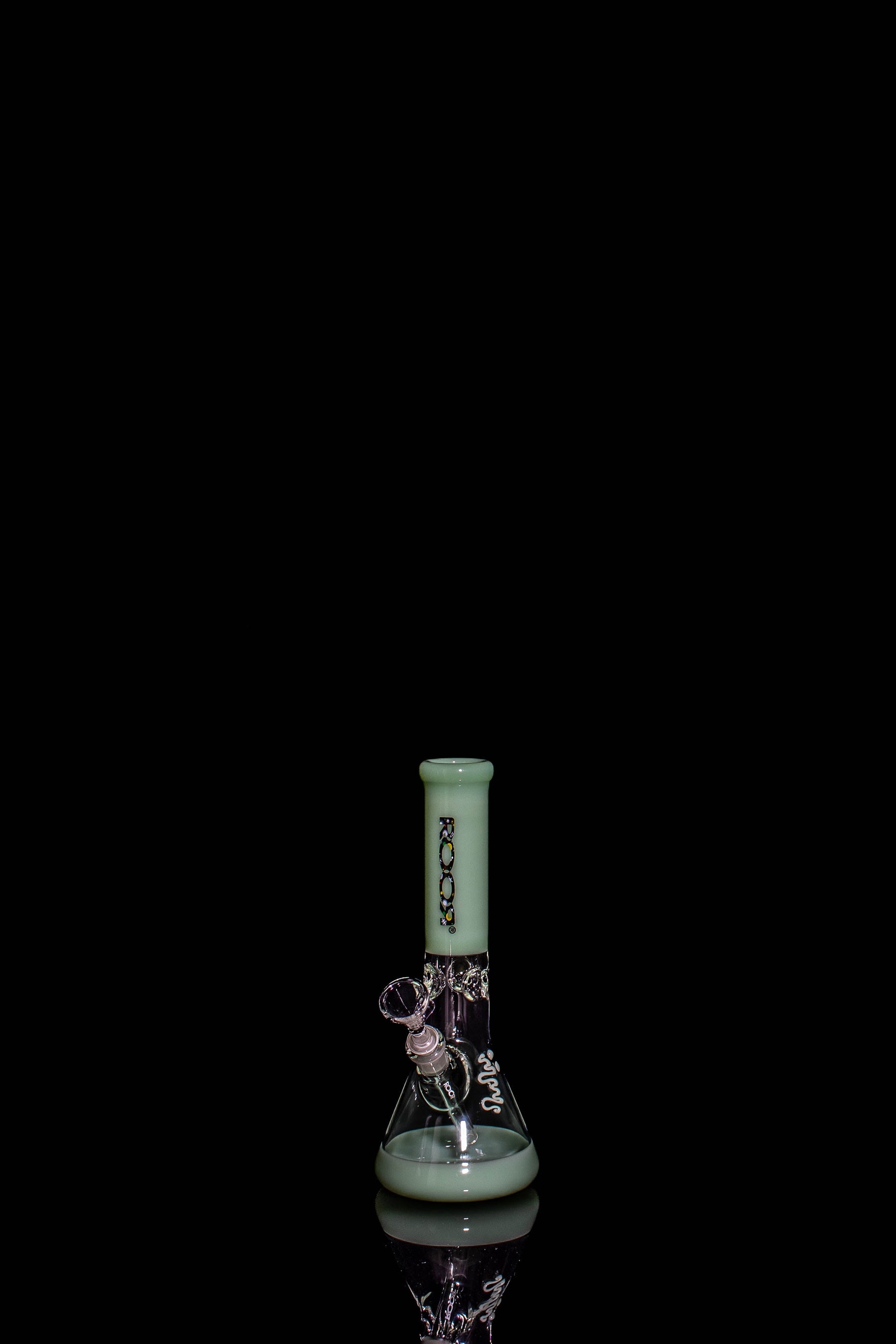 ROOR® Mini 10" Beaker with mint tint, crafted from German Schott glass, featuring ice pinches and amber downstem.