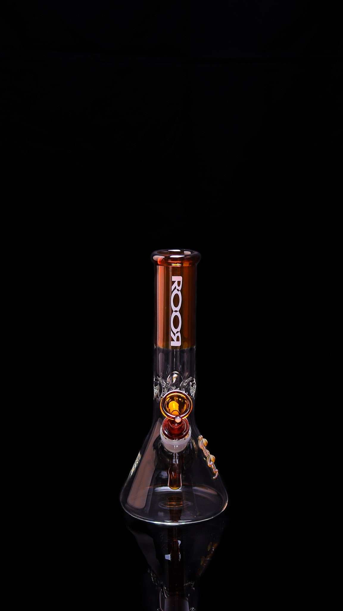ROOR® Mini 10" Beaker 38x4mm Amber glass bong with unique signature and ice pinches.