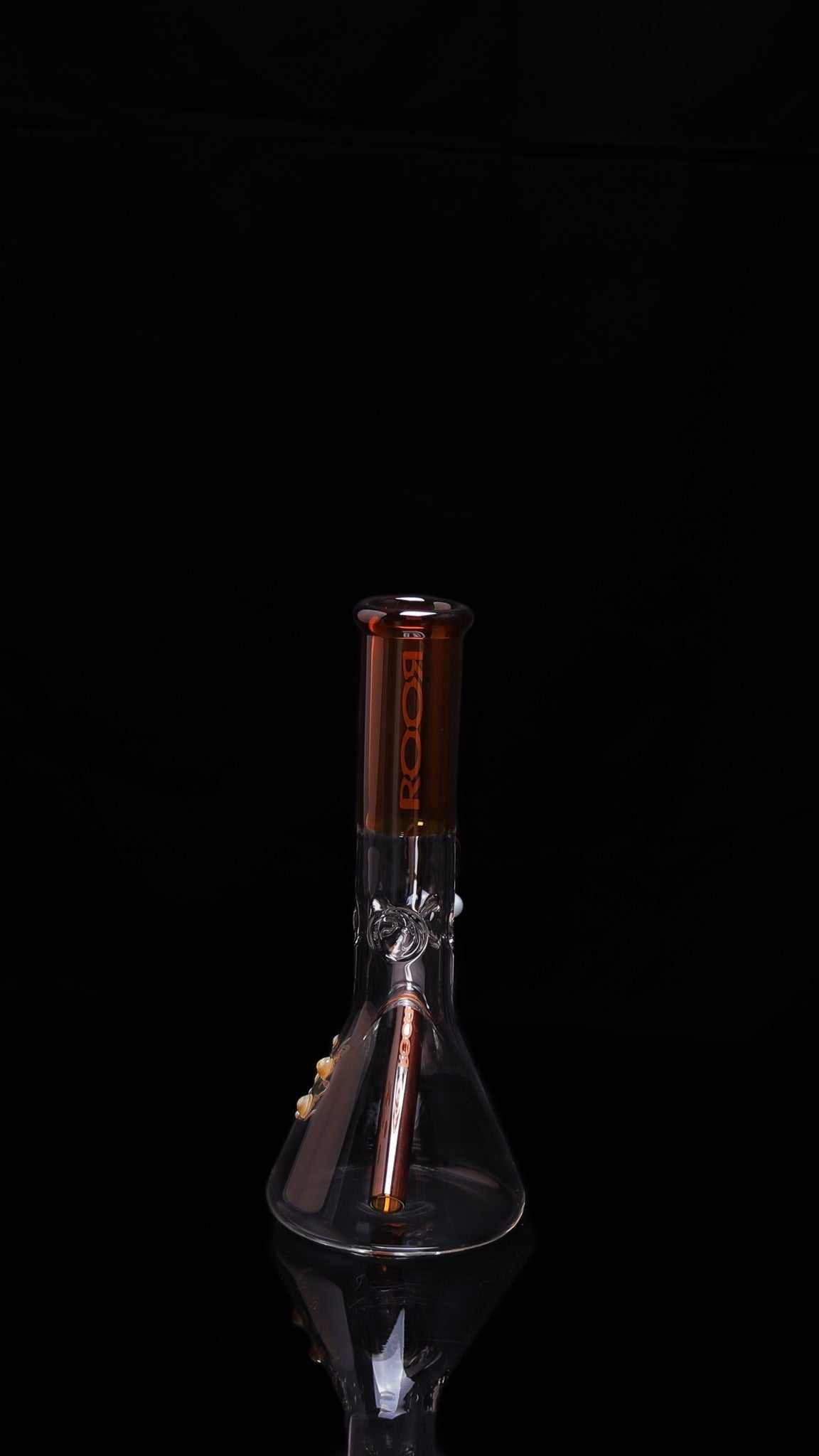ROOR® Mini 10" Beaker 38x4mm in Amber glass with clear base, featuring unique signature and ice pinches.