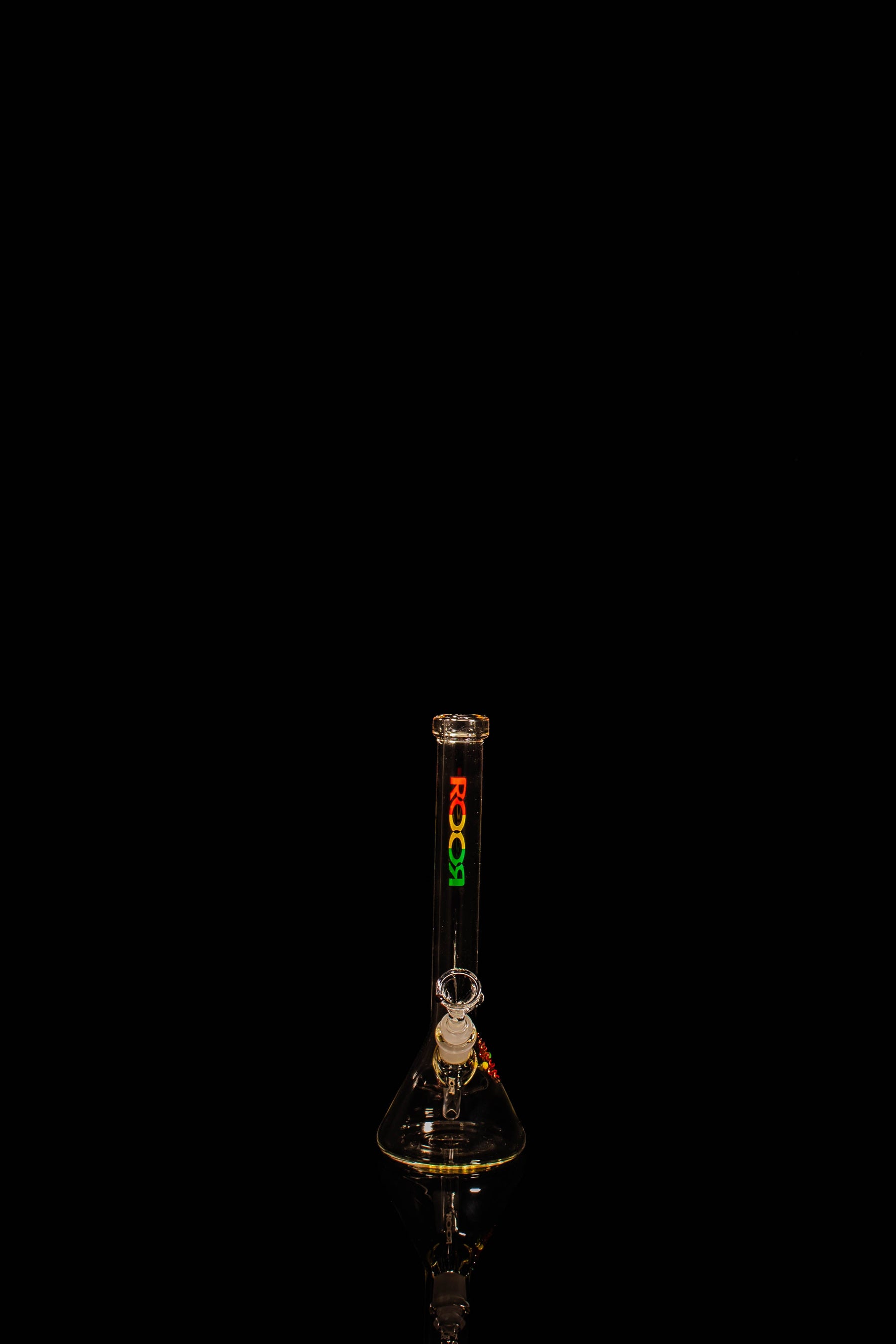 ROOR® Limited Edition Tiny Sista Rasta Decal 10" bong with black background.