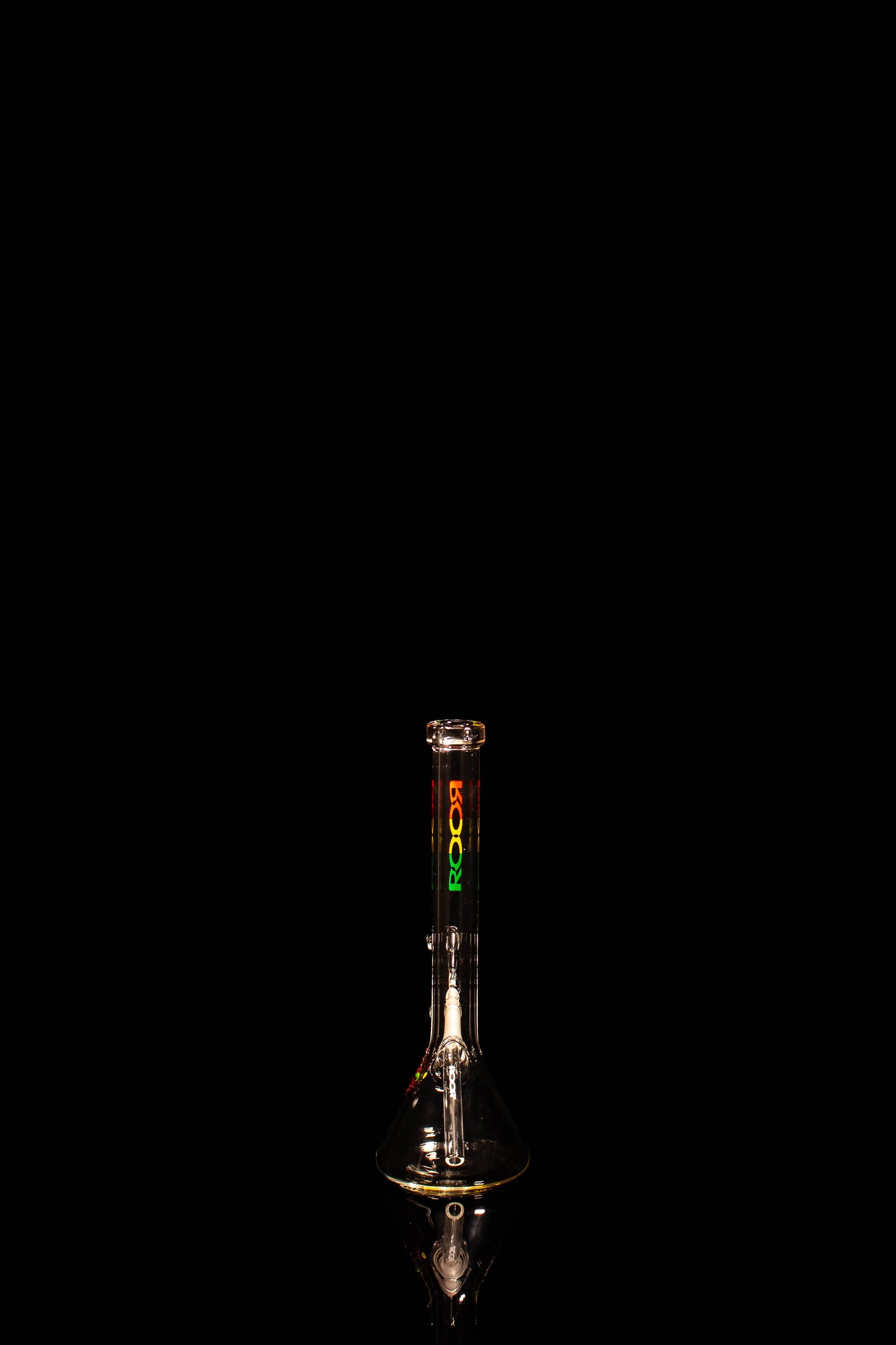 ROOR® Limited Edition Mini 10" Tiny Sista Rasta Decal glass bong with colorful decal on black background.