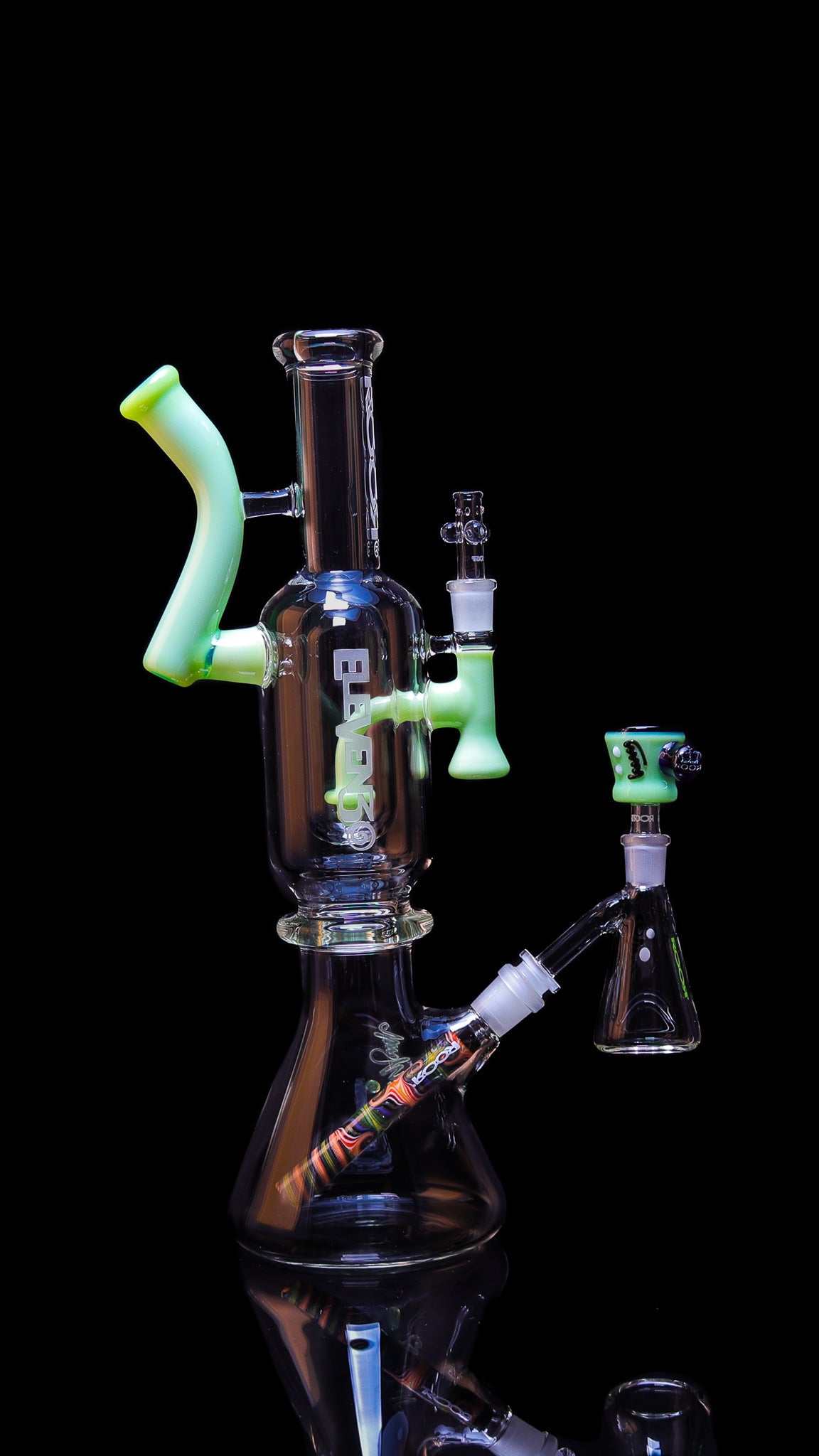 ROOR 1130 Beaker Green Ultimate Collectors Set glass water pipe with green accents and multiple attachments on black background