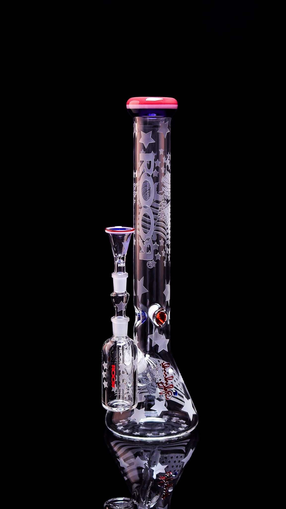 ROOR® Strains Presidential 18” glass beaker with matching 14mm ashcatcher, sandblasted design, red accents.