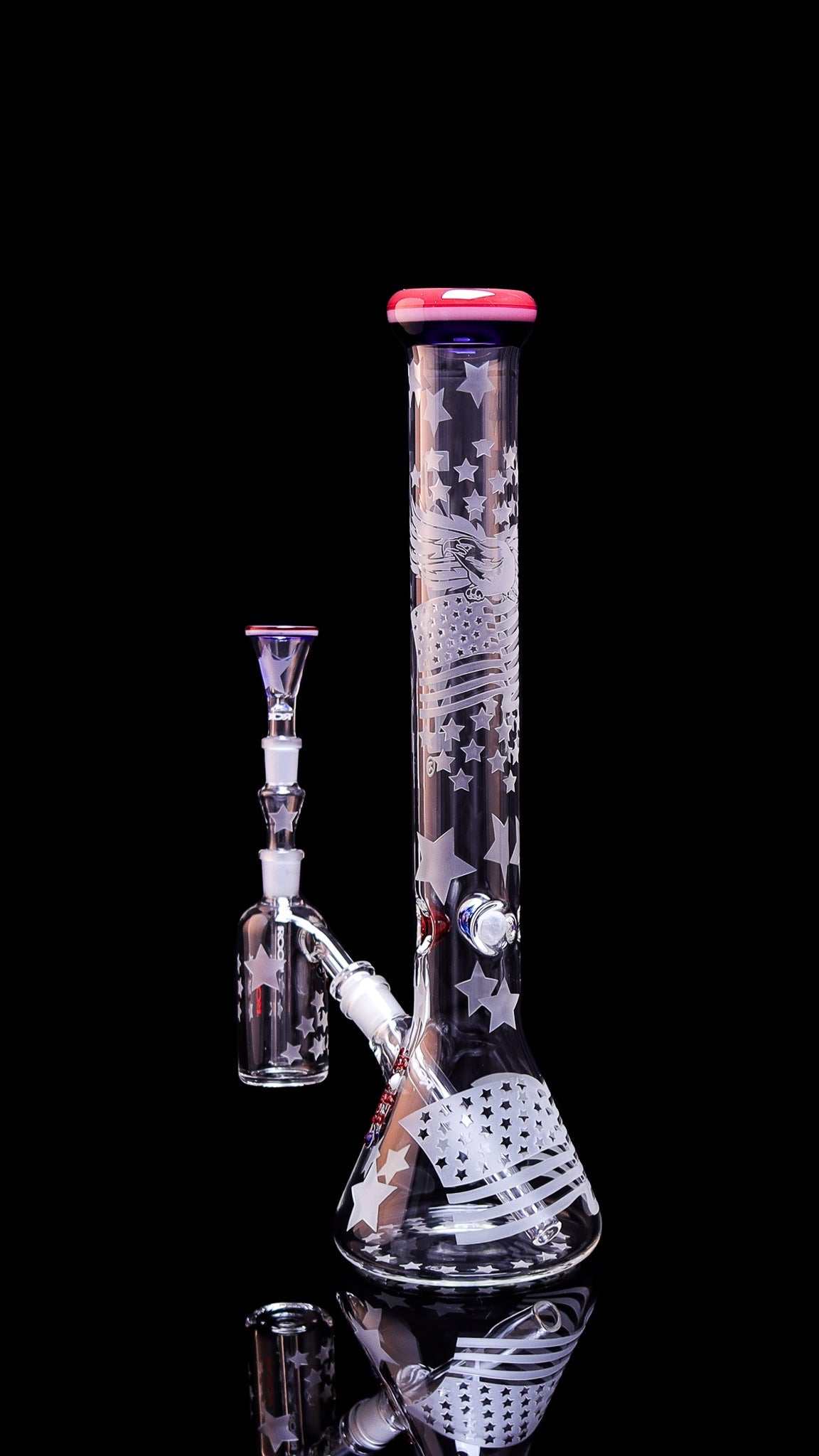 ROOR Strains Presidential 18” beaker with matching 14mm ashcatcher featuring sandblasted American flag design and red mouthpiece.
