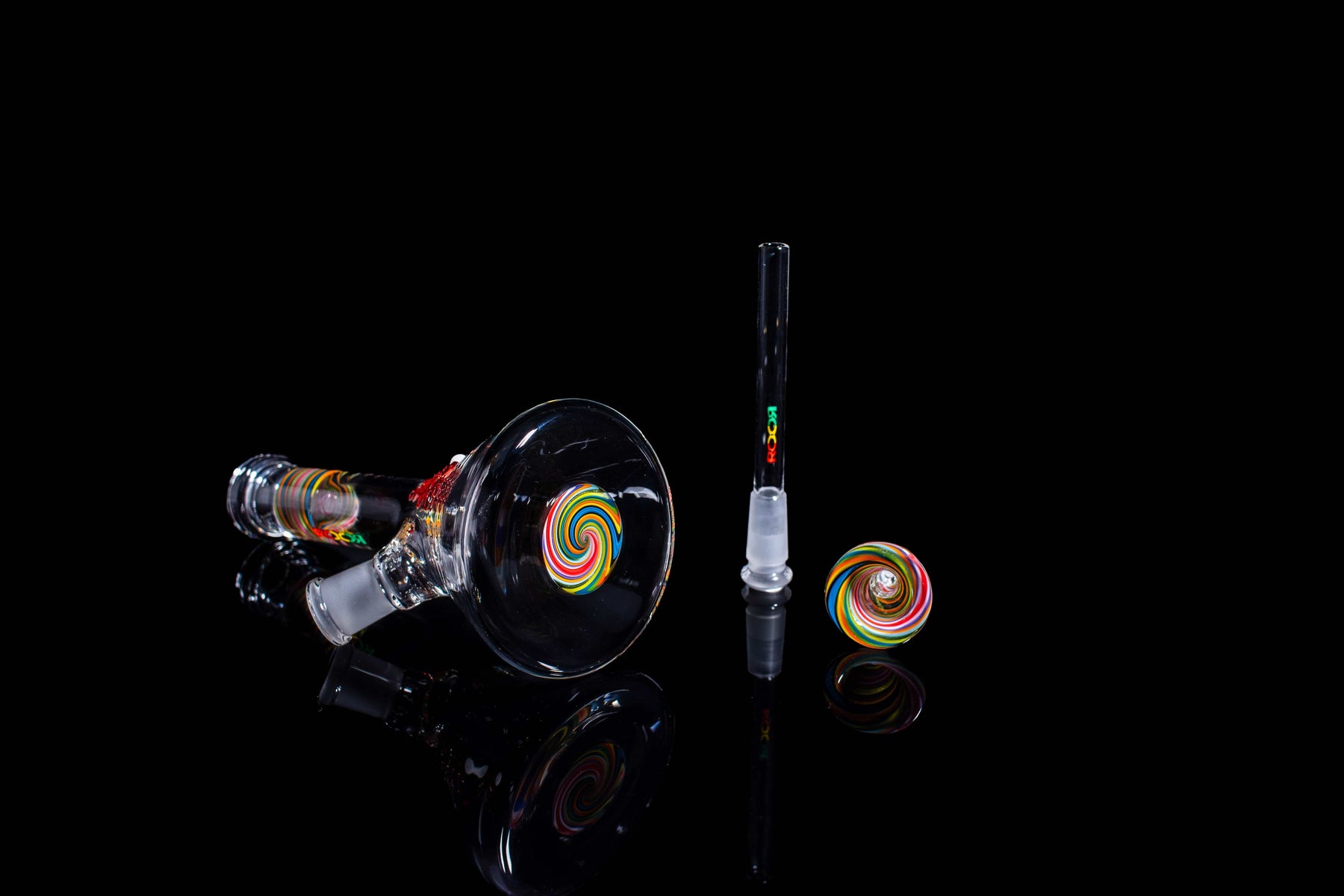 ROOR Micro 6-inch beaker bong with 26x4mm custom color worked sections and Rasta decals on black background