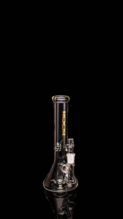 ROOR® Tech Mini Fixed 10” Beaker 38x4mm Clear with glass design and decal, on black background.