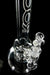 Close-up view of clear ROOR Tech 14” Bubbler glass pipe with black and white decal on neck