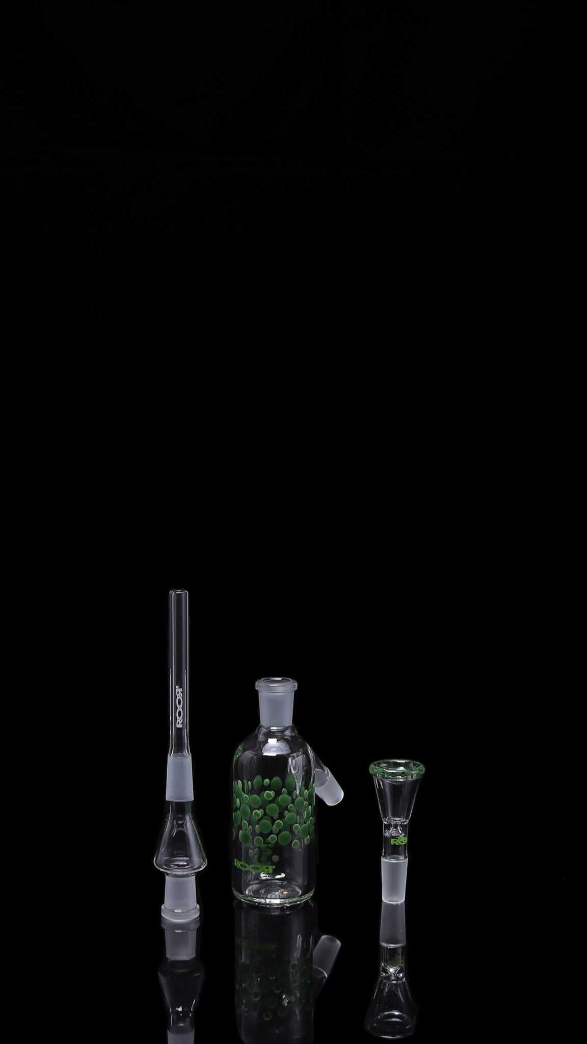 ROOR® Classic Ash Catcher 14.5mm joint with green pearl dot design and matching funnel bowl and downstem set on a black background