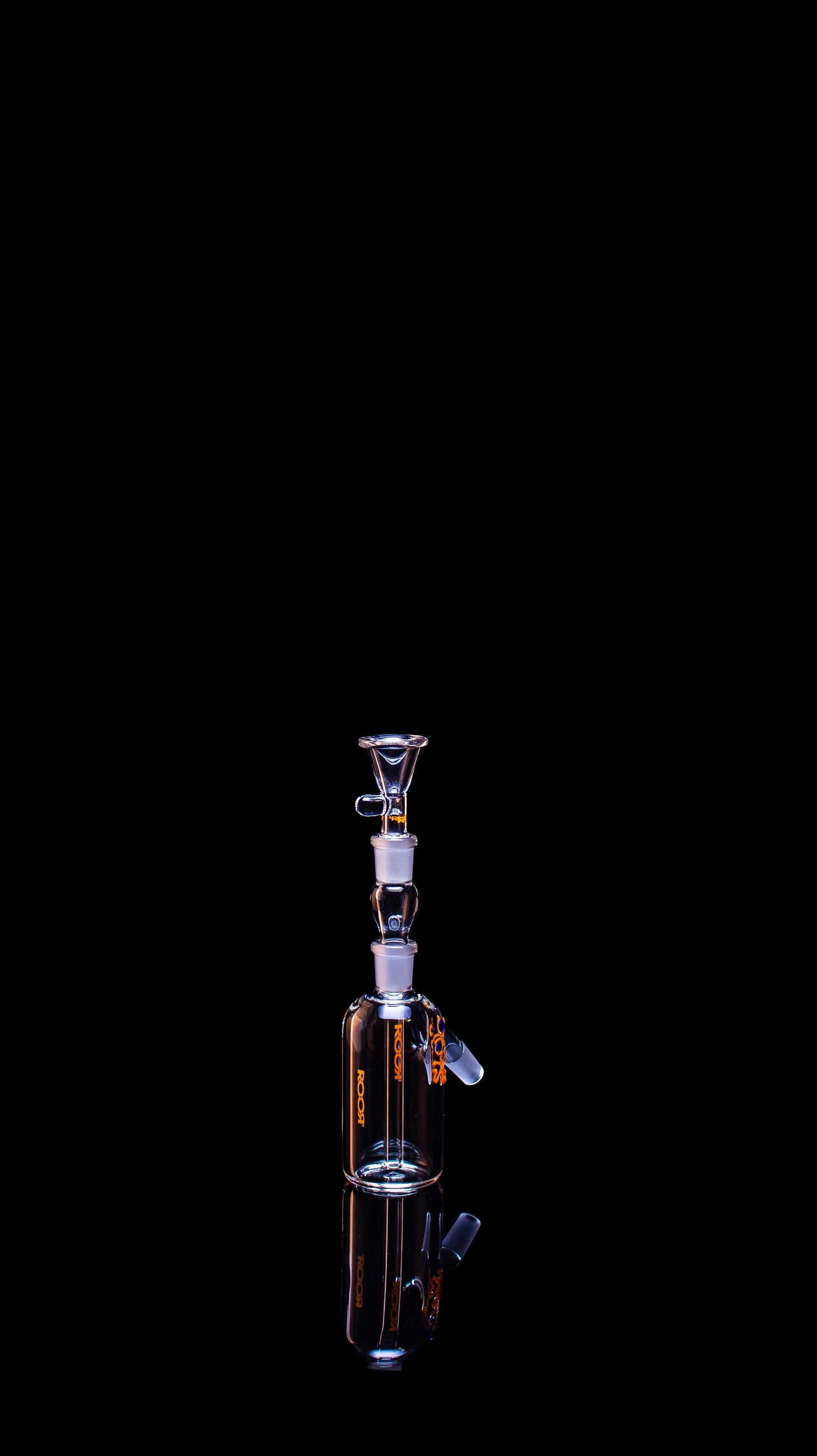 ROOR® Classic Ash Catcher 14.5mm Joint ORANGE Edition with orange decal, durable glass construction on black background.