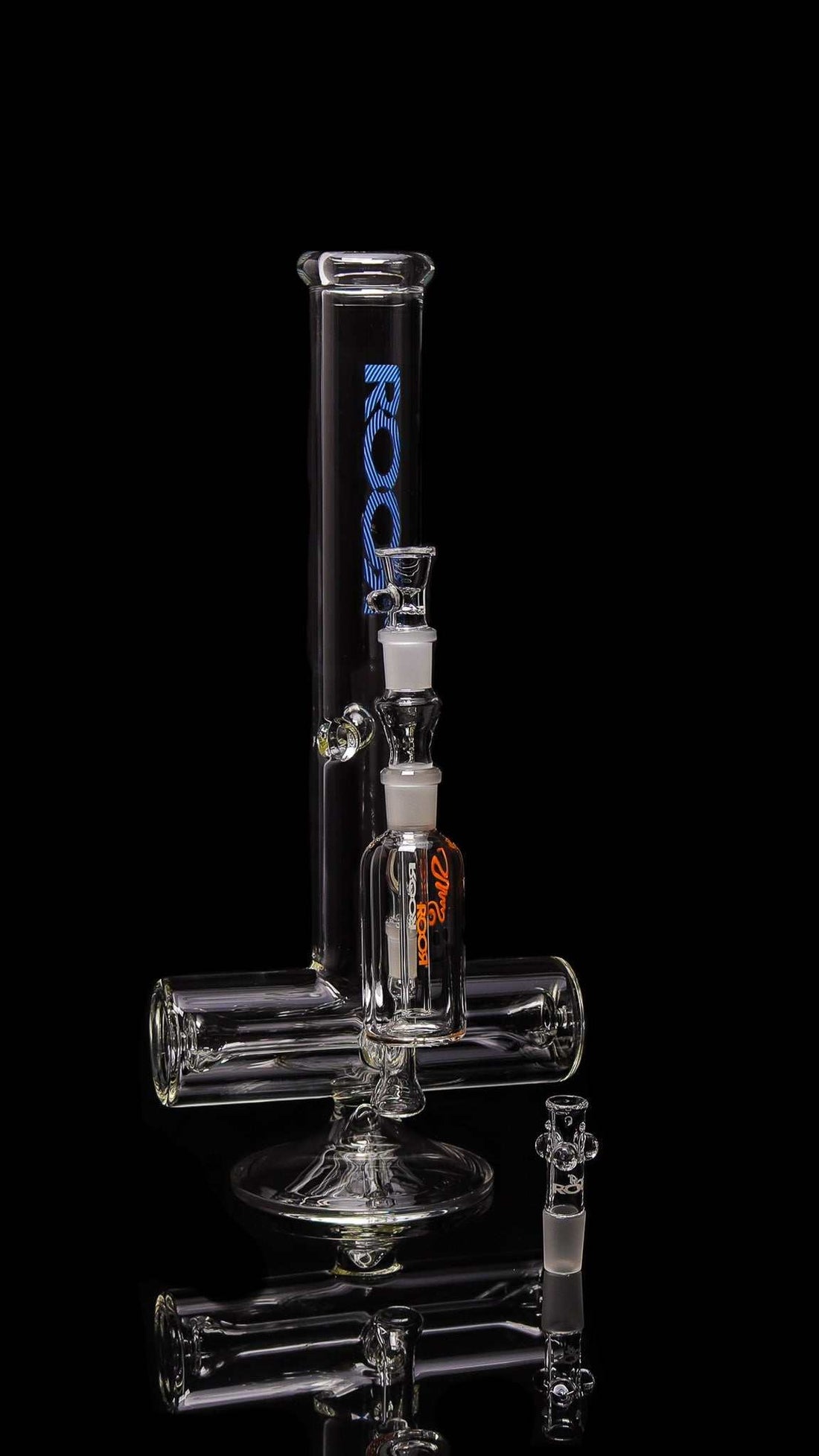 Clear ROORTech 18-inch Inline glass water pipe with Too Blue decal and orange ROOR Classic ash catcher, featuring 50x5mm German Duran Schott glass for smooth hits.