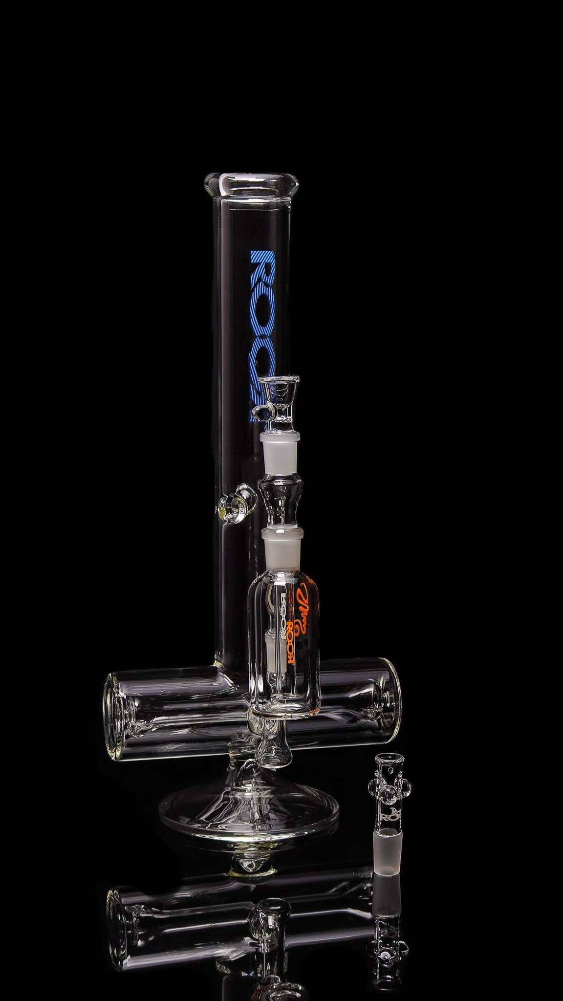 Clear ROORTech 18-inch Inline glass water pipe with Too Blue decal and orange ROOR Classic ash catcher, featuring 50x5mm German Duran Schott glass for smooth hits.