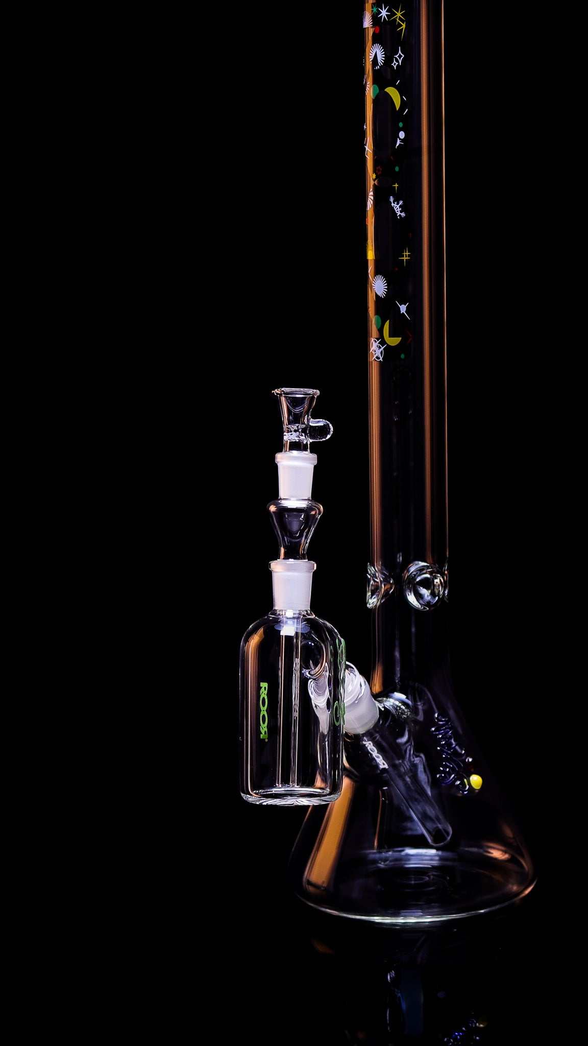 ROOR® Classic Ash Catcher 14.5mm attached to a glass piece, showcasing German Duran Schott Glass craftsmanship.