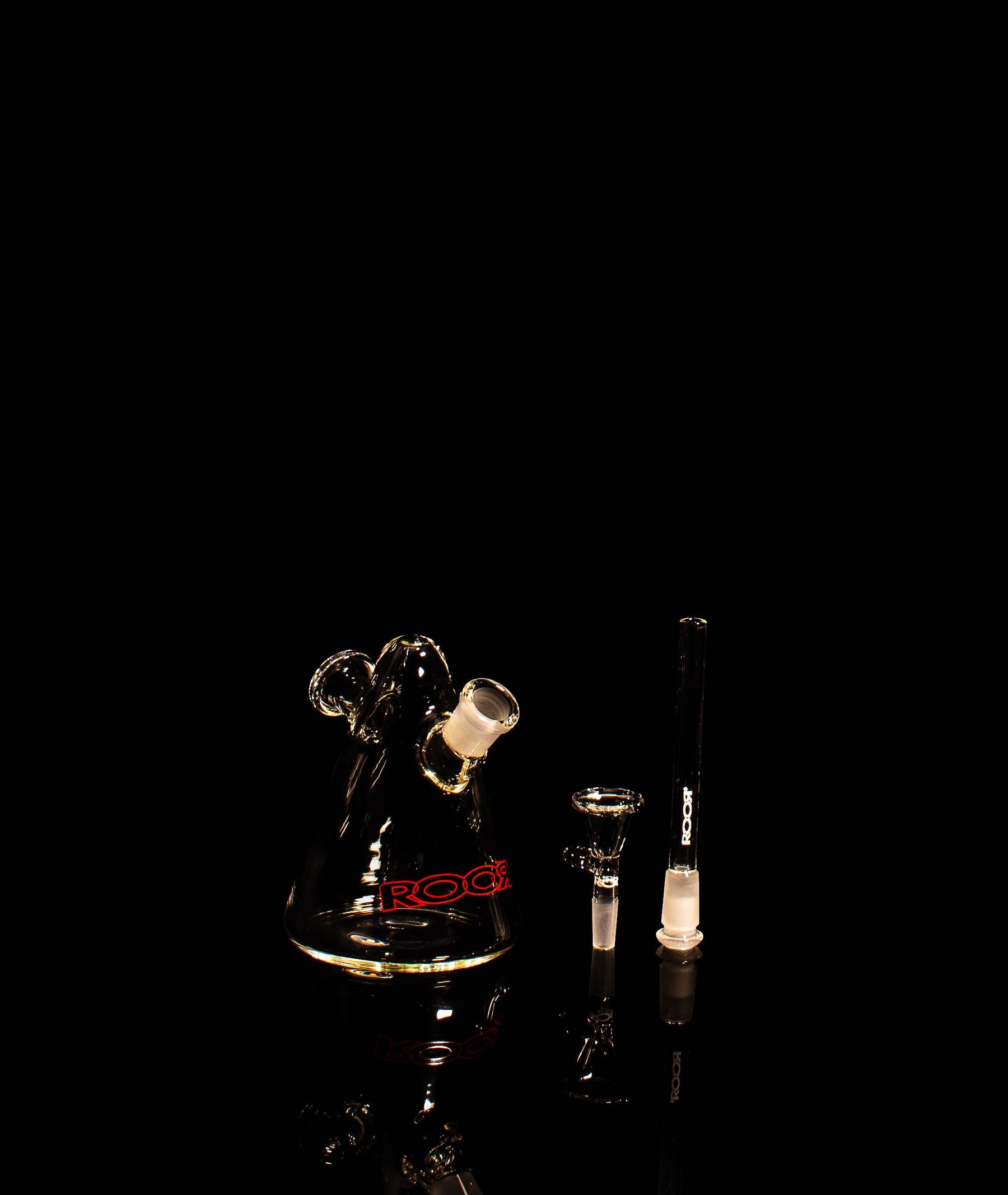 Limited Edition Mini Glass Egg with downstem and bowl on black background.