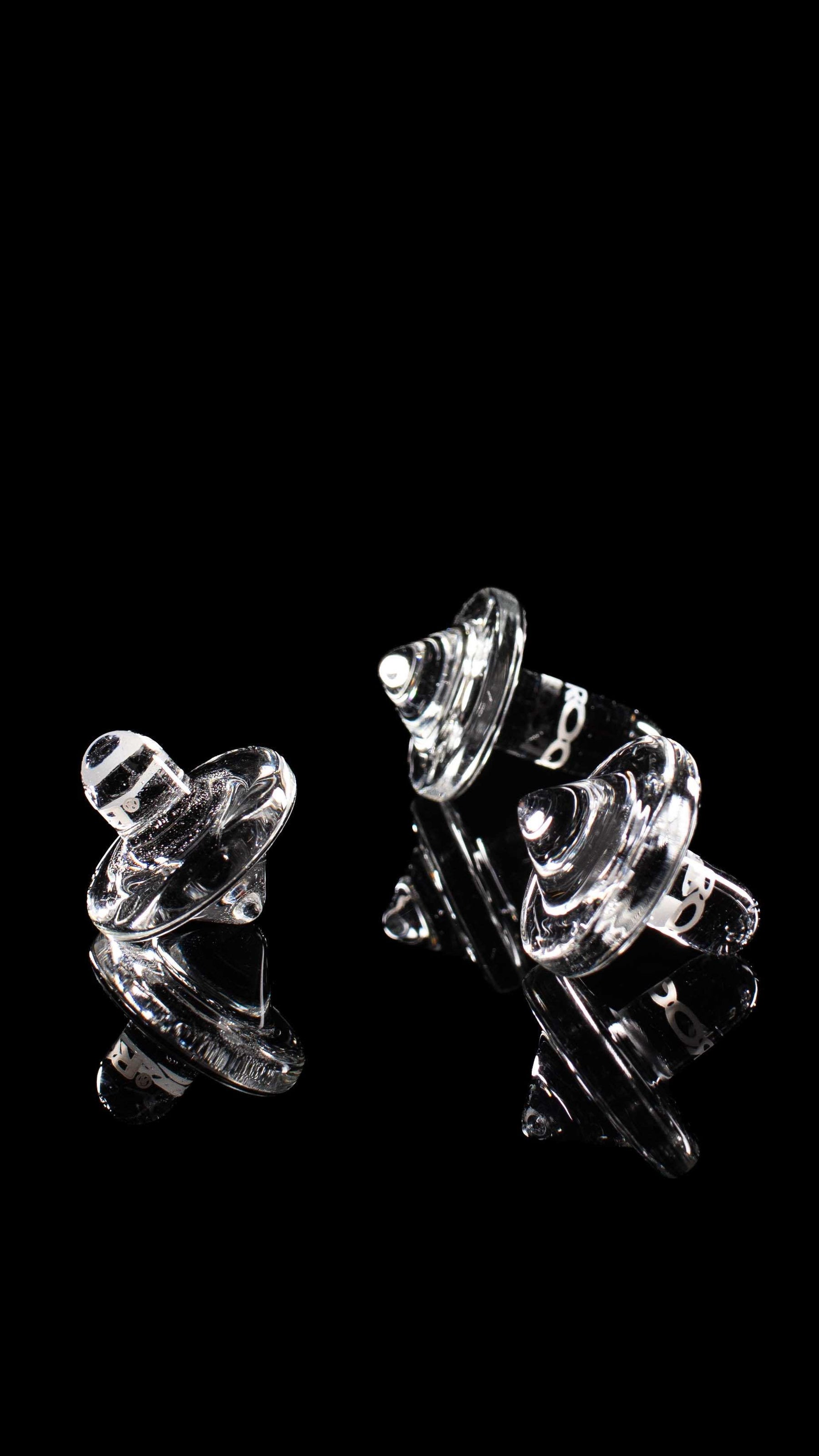 ROOR® Glass Spinning Top Carb Cap for controlling airflow and vaporization