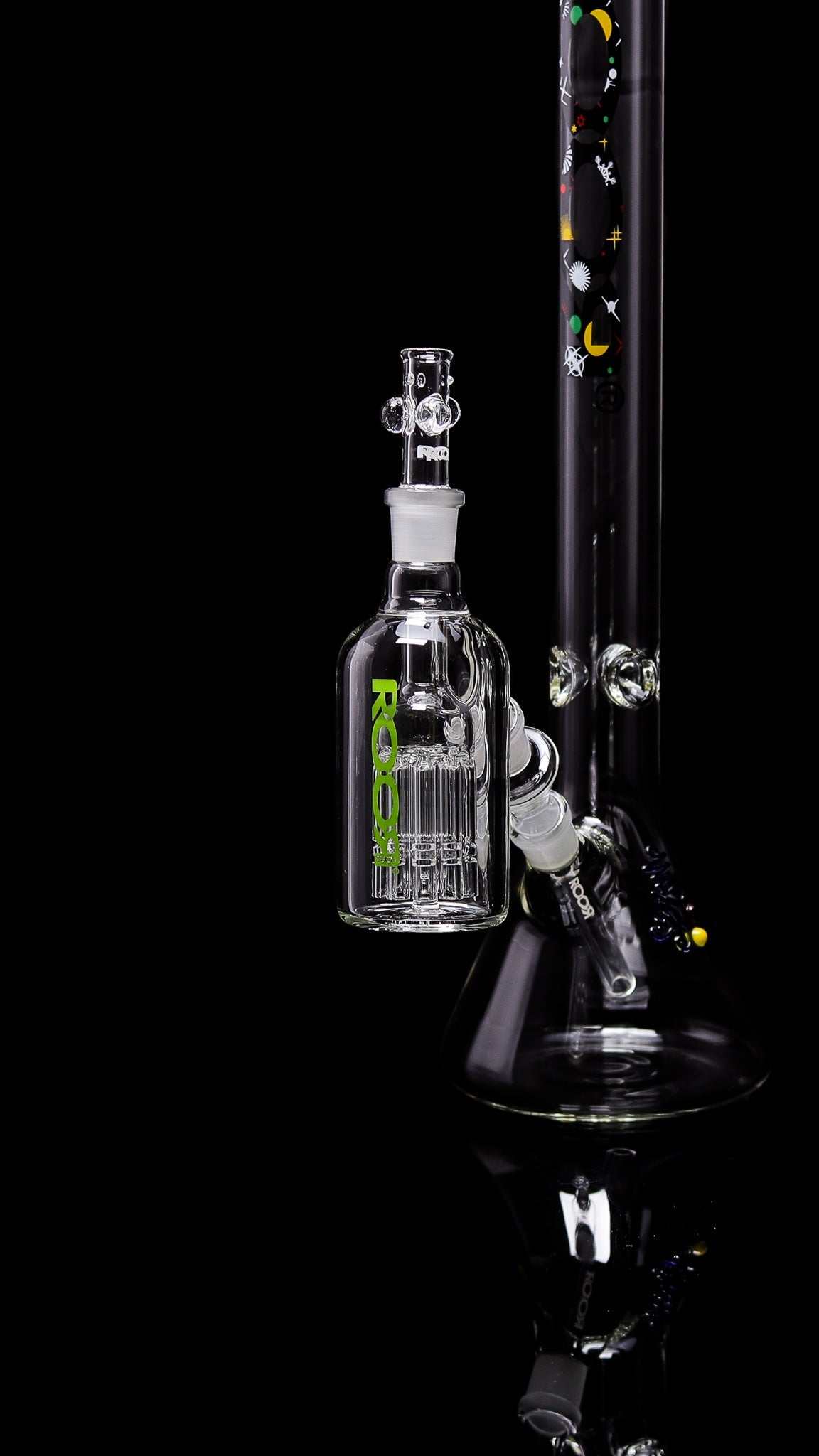 ROOR® Tech® Ash Catcher 18.8mm with 10-arm tree perc and 45° arm style attached to glass bong.