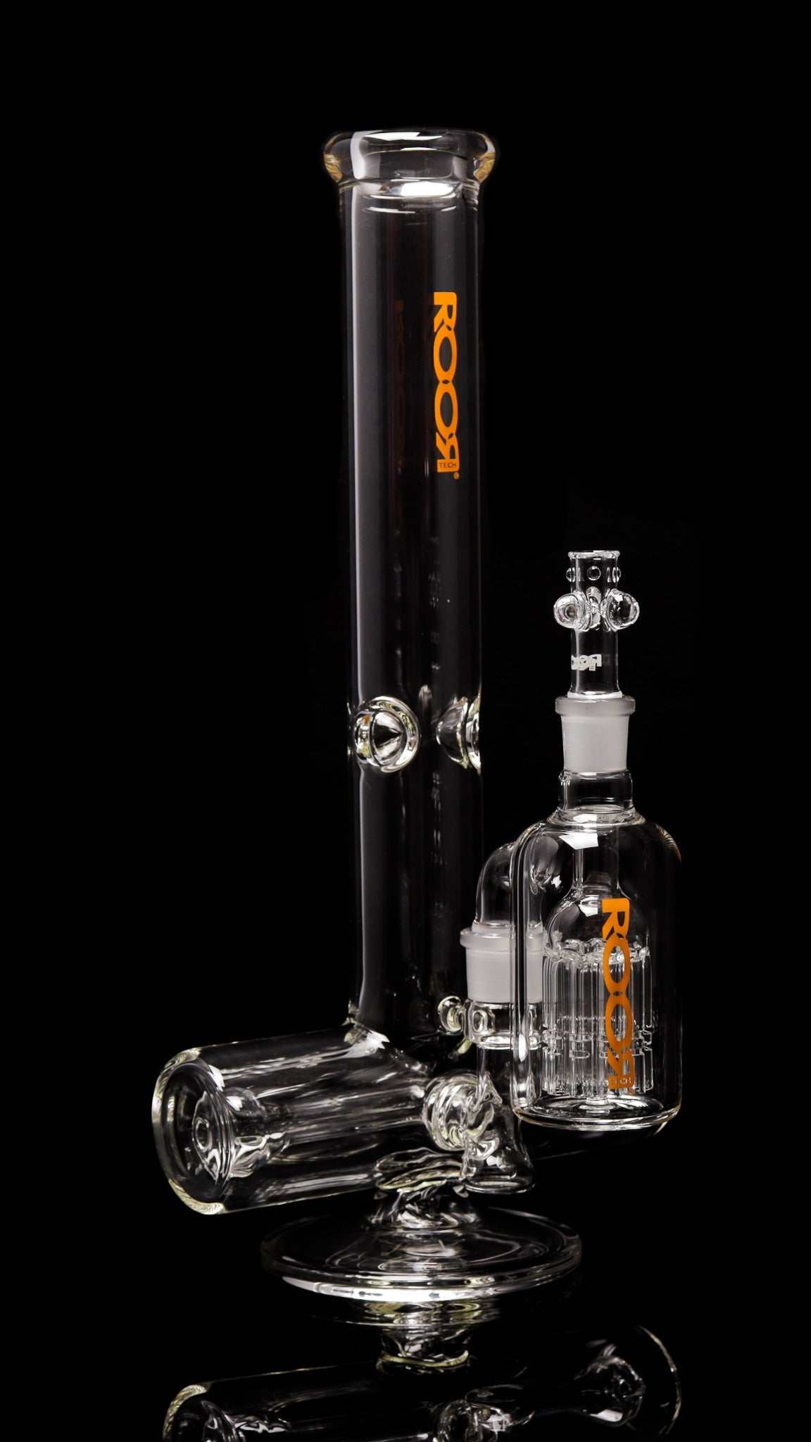 ROORTech Inline 18" 50x5mm glass water pipe with orange logo and matching 10-arm ashcatcher on black background