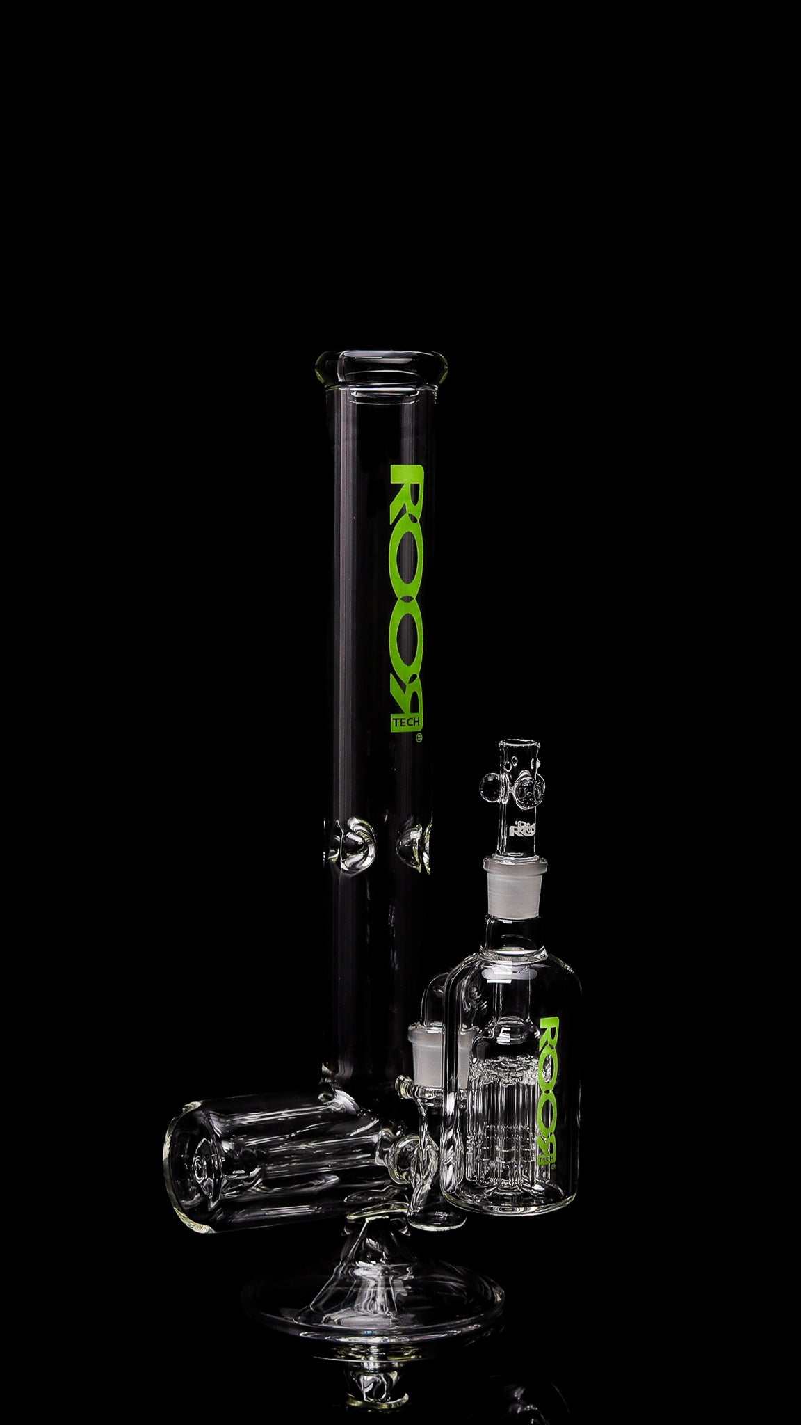 Collectors set ROORTech inline 18-inch green glass water pipe with matching 10-arm ashcatcher on black background