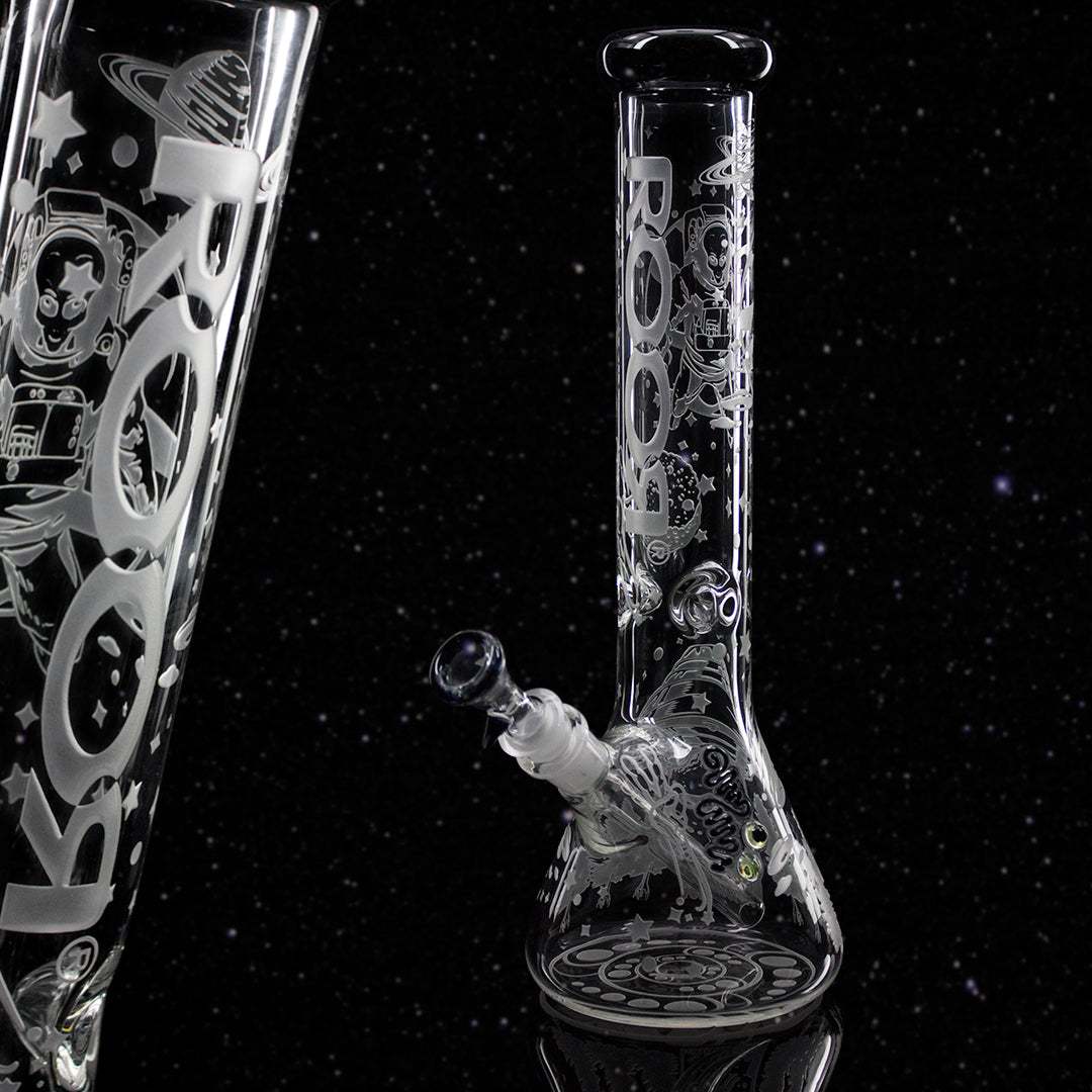 ROOR 14" Beaker 45x5mm Alien O.G. clear glass bong with intricate space-themed sandblasted designs and colored mouthpiece against a starry background