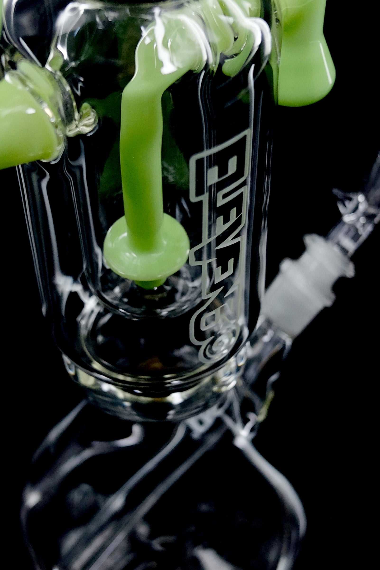Close-up of ROOR® 1130 Beaker Green glass water pipe with detailed percolator and joint features