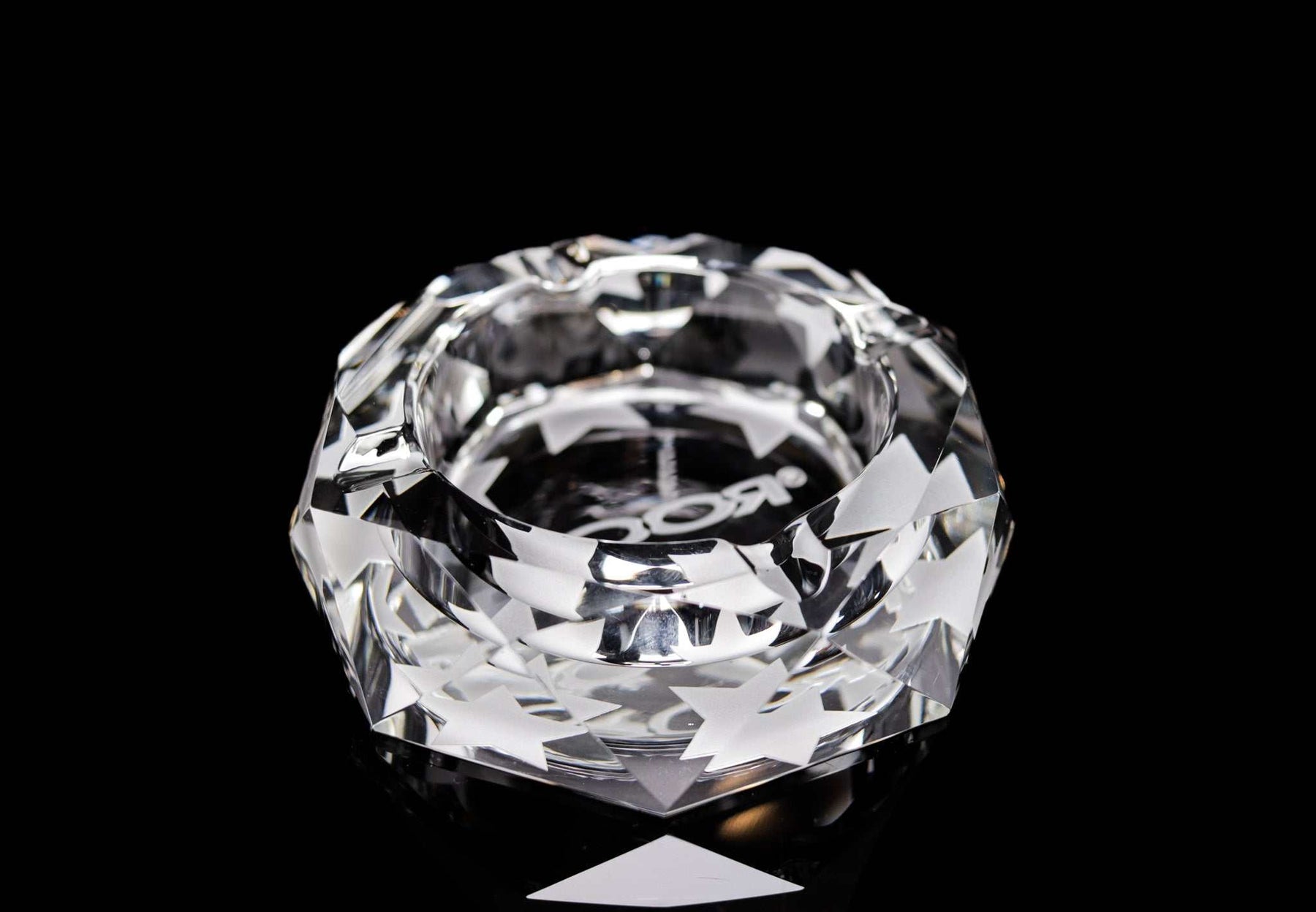 Clear ROOR Glass Crystal Cut Ashtray Strains Presidential OG with faceted edges on black background