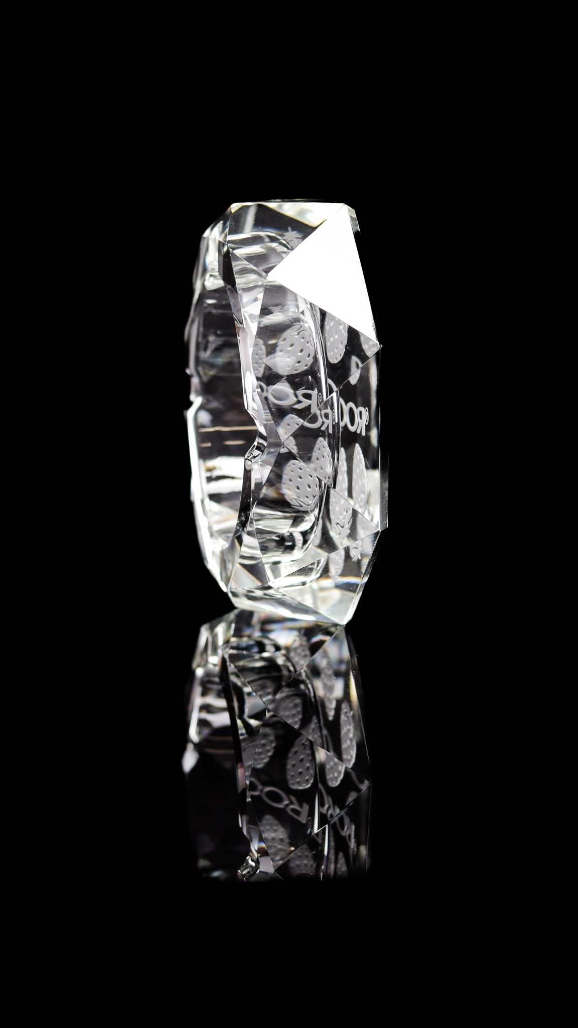 ROOR Glass Crystal Cut Ashtray Strains Strawberry Dream with engraved design on black background