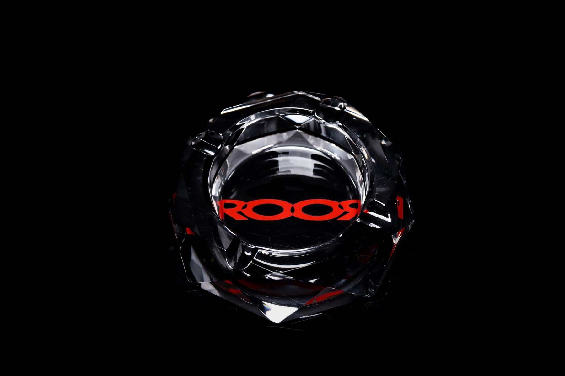 ROOR glass crystal cut ashtray with red color decal on black background