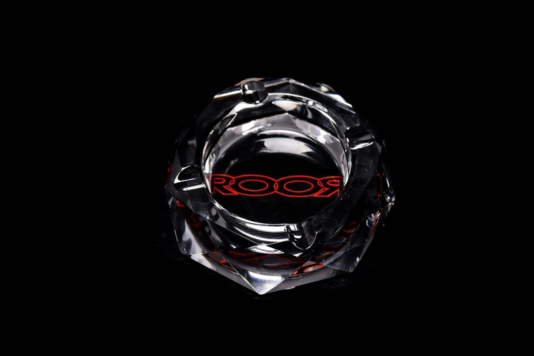 ROOR glass crystal cut ashtray with red color decal on black background