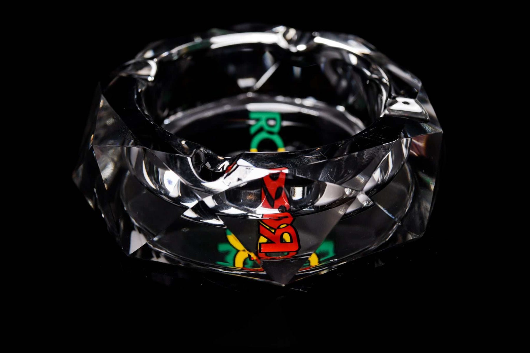 ROOR Glass crystal cut ashtray with colorful decal on black background