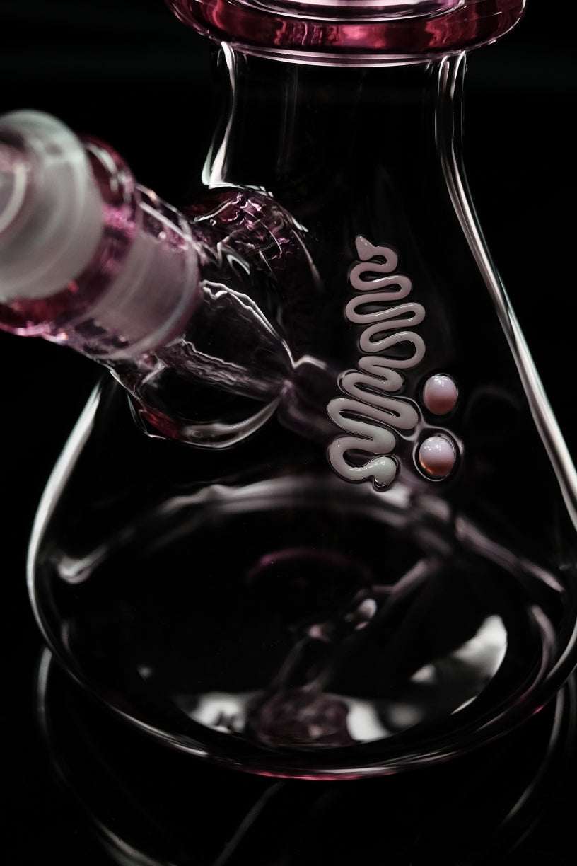 ROOR® X 1130 Beaker Pink glass with intricate design, featuring a sturdy base and pink accents.