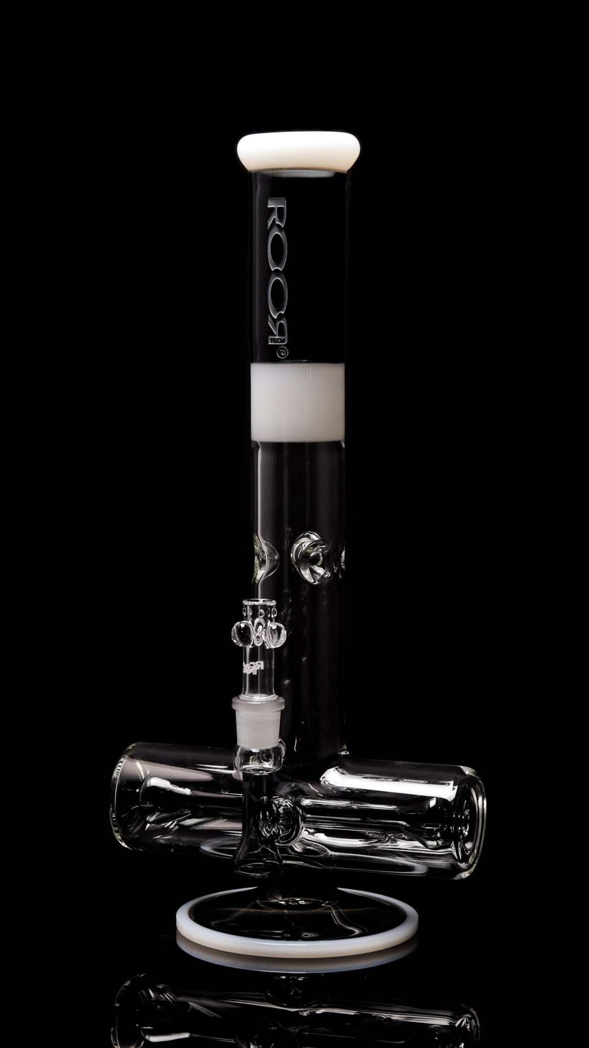 ROOR® Tech 18” Inline in Smokey Grey with White Sandblasted Logo on a glass water pipe.