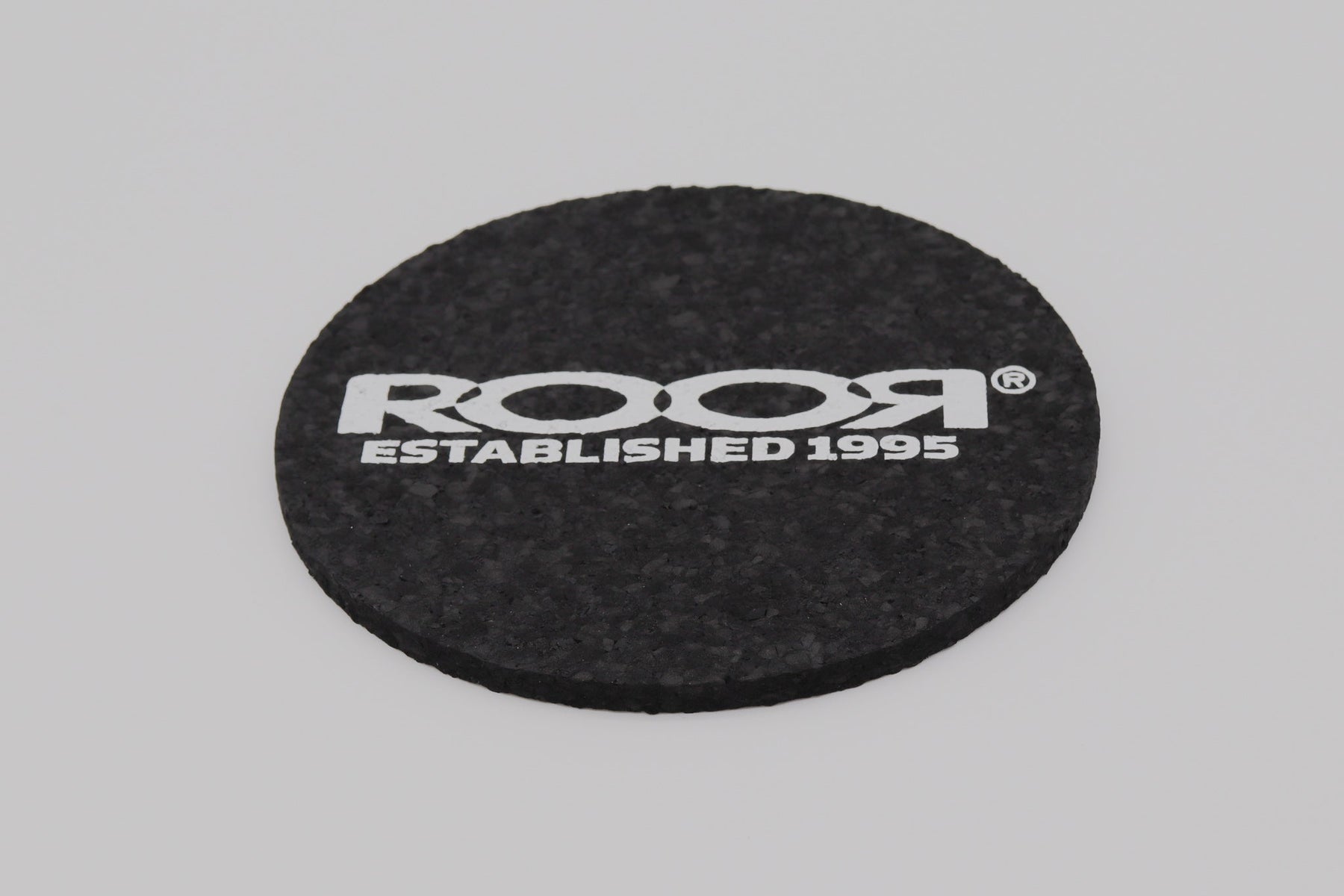 ROOR Coaster Round black rubber coaster with white logo and "Established 1995" text