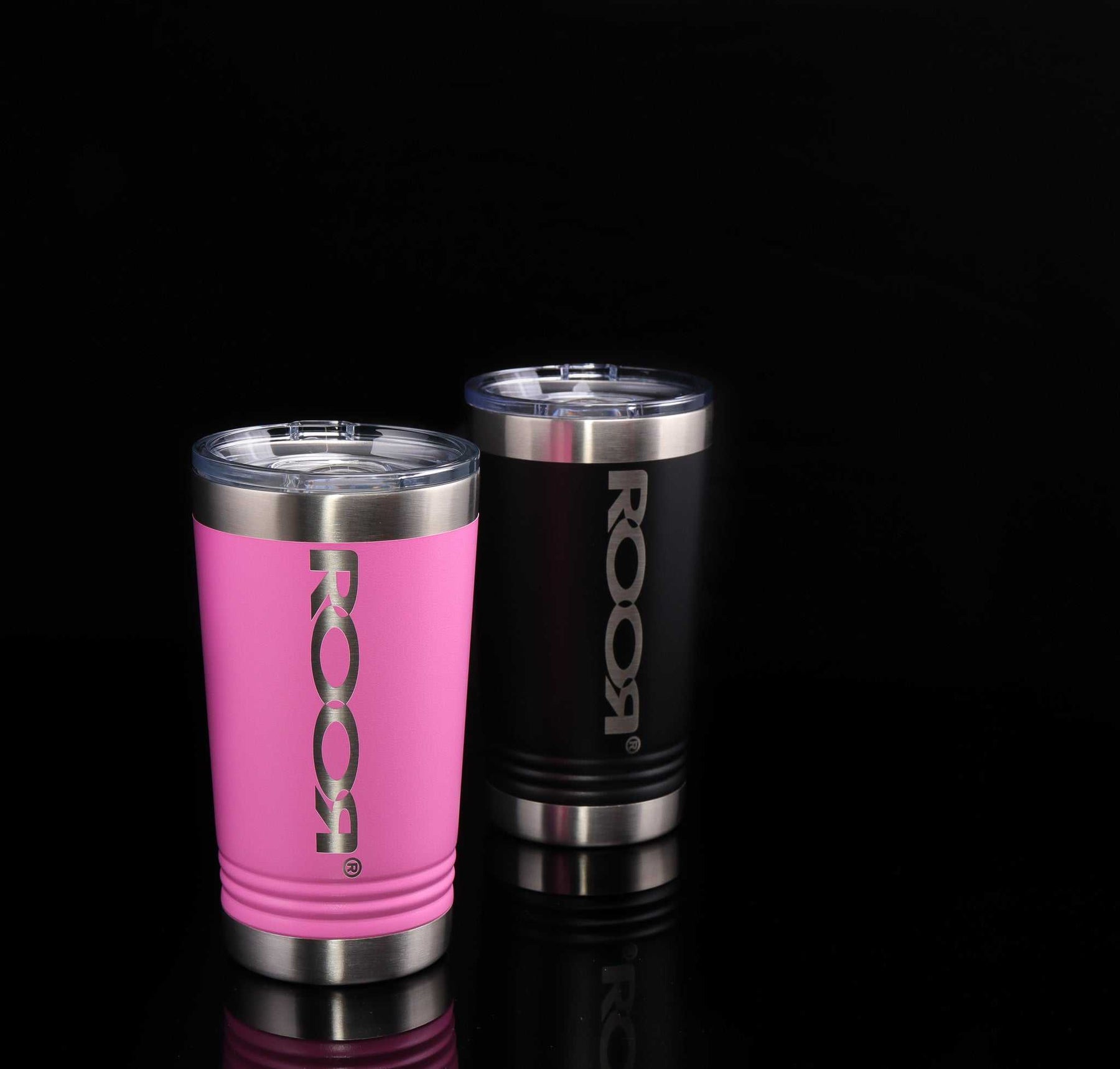 ROOR Tumbler 16oz stainless steel laser-engraved in pink and black with slider lids on black background