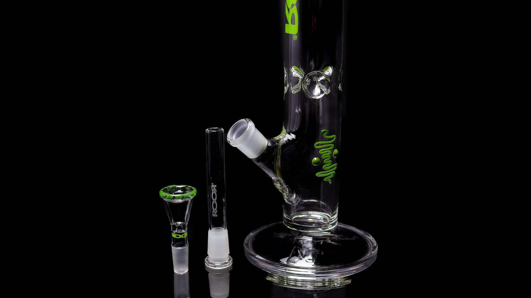 ROOR Classic 14" Straight glass bong with green pearl dot accents and accessories on black background
