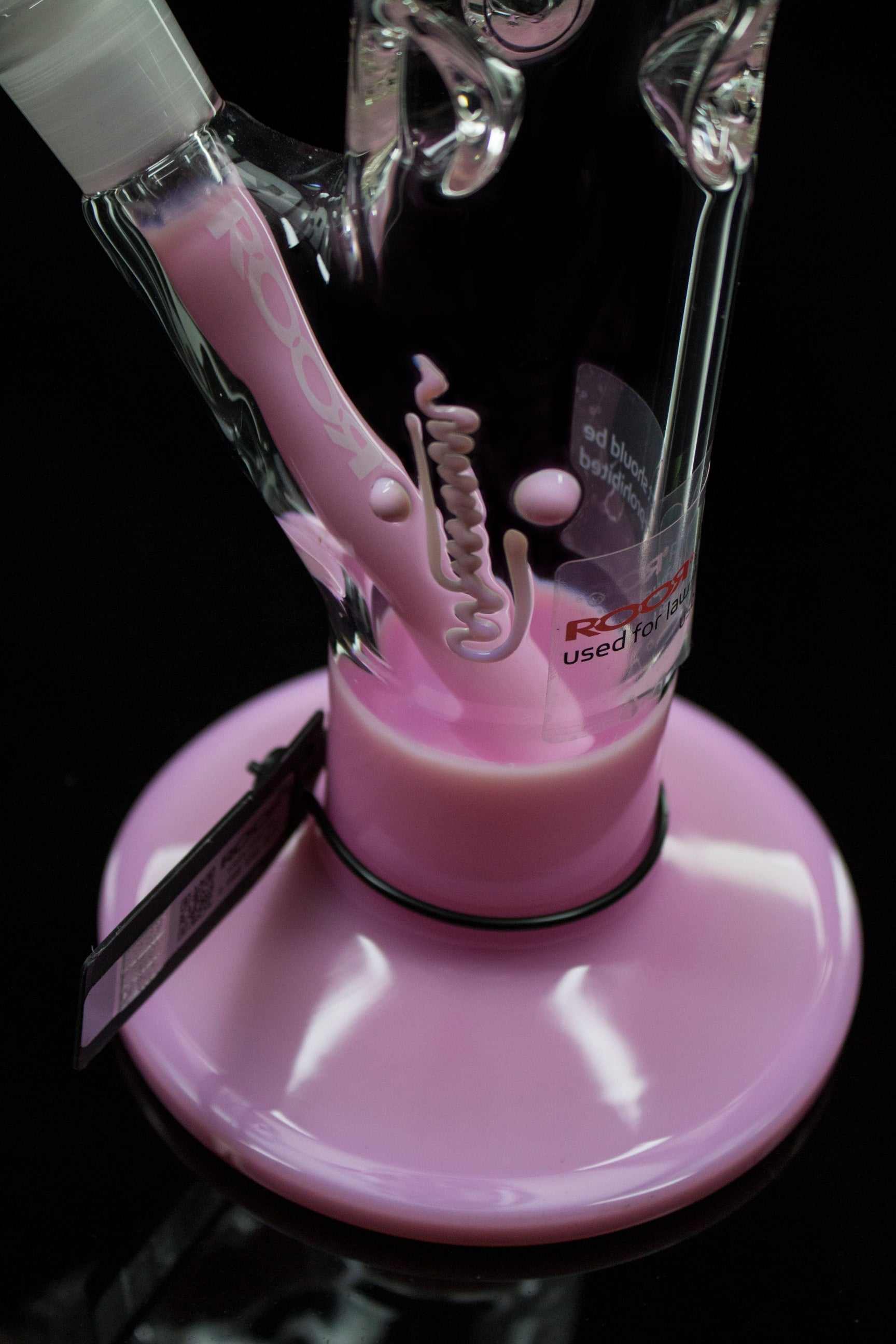 Close-up of ROOR® Classic 14" Color Straight 50x5mm Pink glass base with signature and decal visible