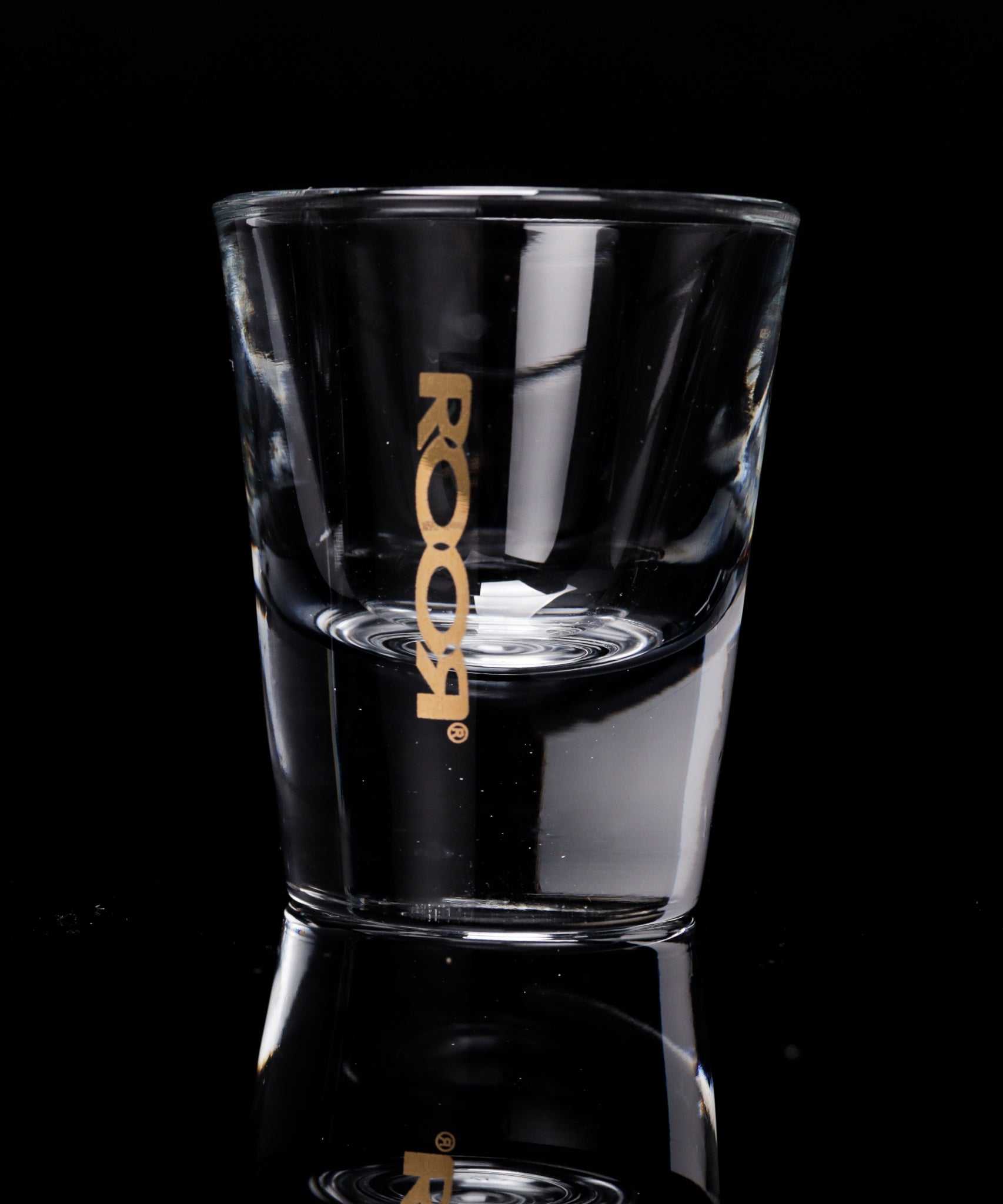 ROOR Shot Glass 1oz with thick clear base and assorted decals.
