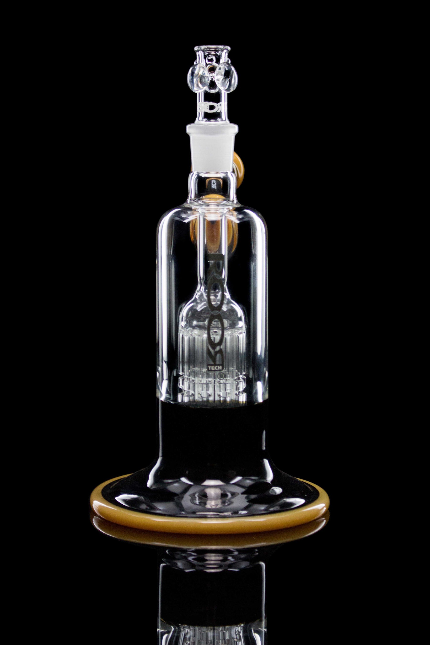 ROOR Tech Fixed 10-Arm Tree Bubbler with black and tangie color accents on clear glass body against black background