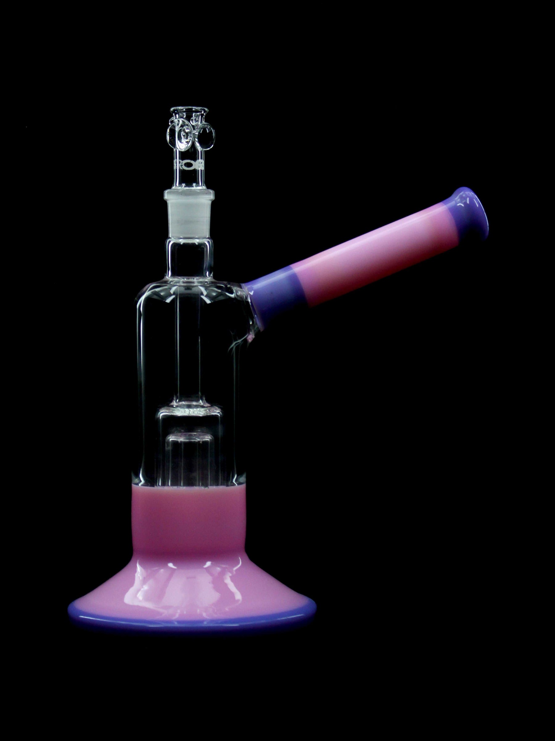 ROOR Tech Fixed Barrel Bubbler in purple and pink with glass percolator and stemless design on black background