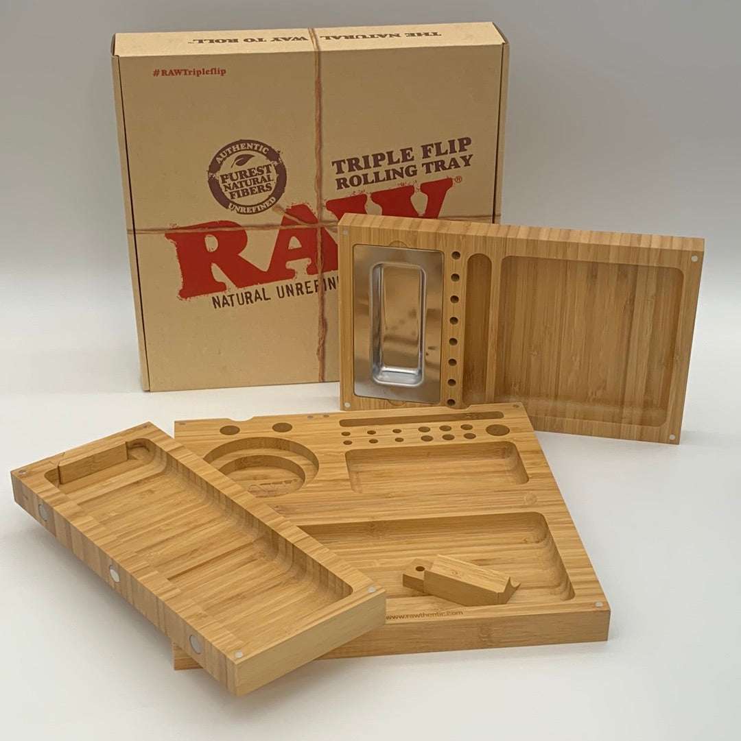 RAW Triple Flip Rolling Tray with multiple compartments and integrated ashtray next to its packaging box