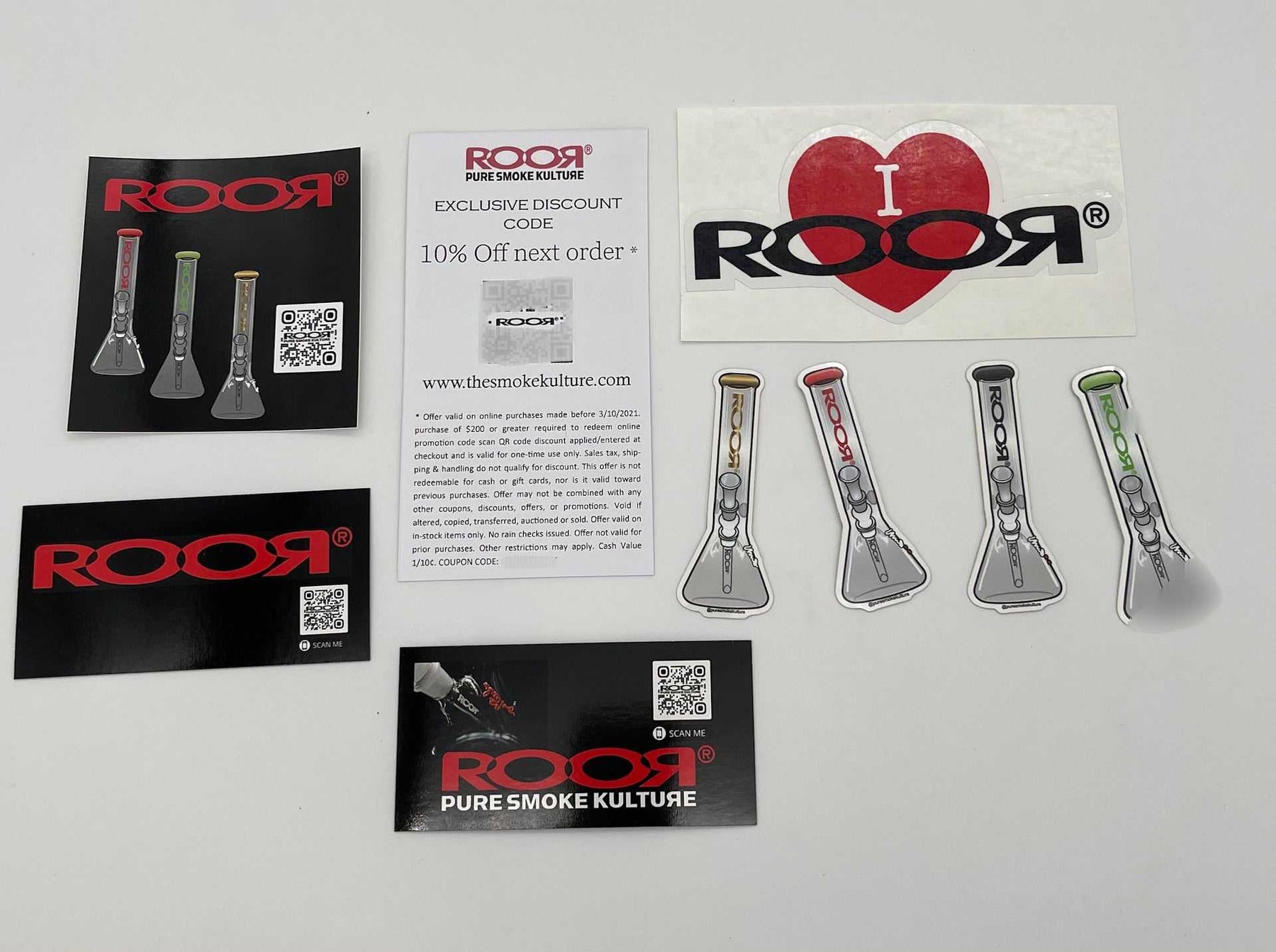ROOR Collectible Stickers Mini set including mini beaker stickers, I love ROOR sticker, discount code card, and promotional items on white background