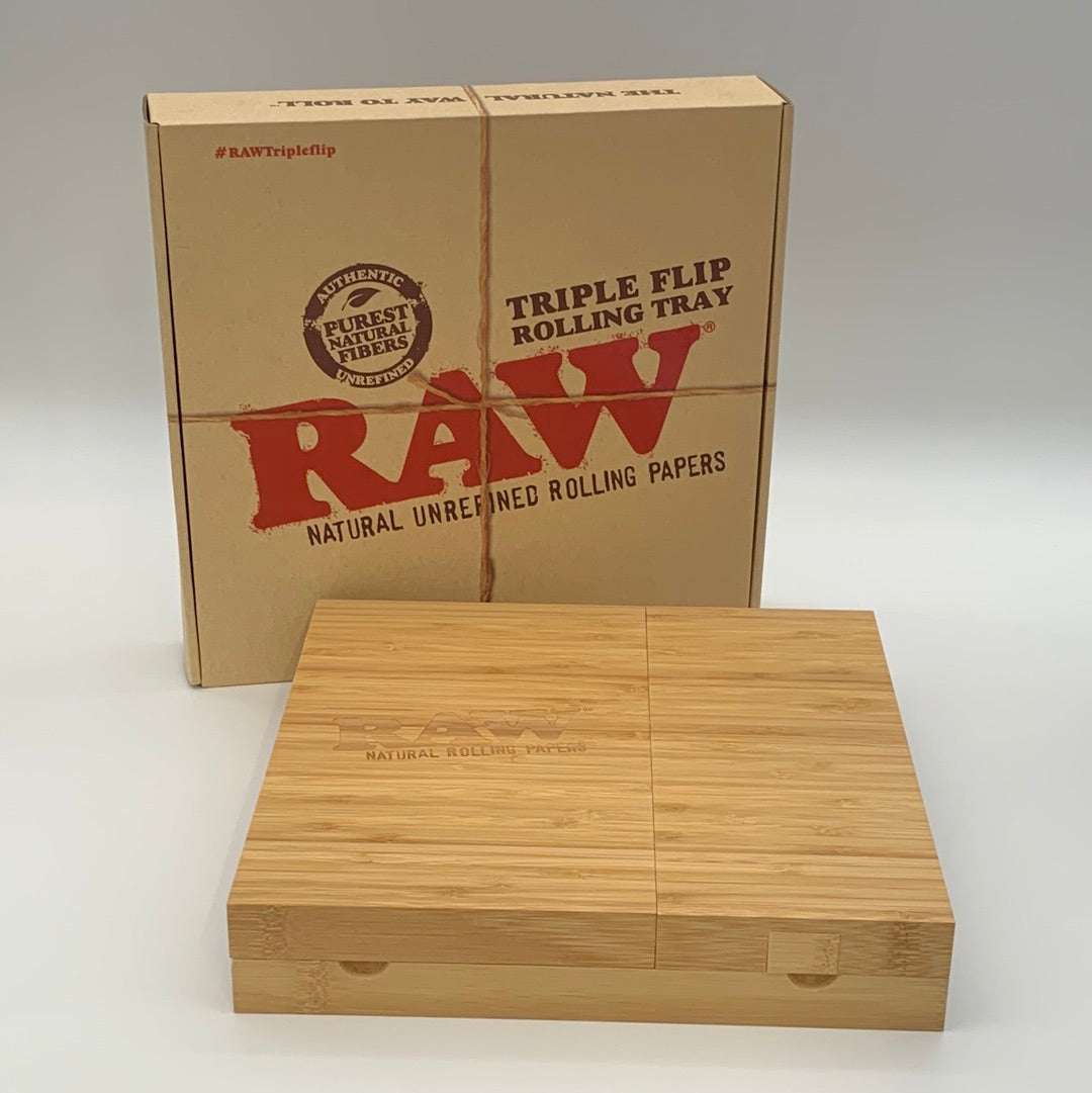 RAW Triple Flip Rolling Tray with natural bamboo finish and packaging box behind